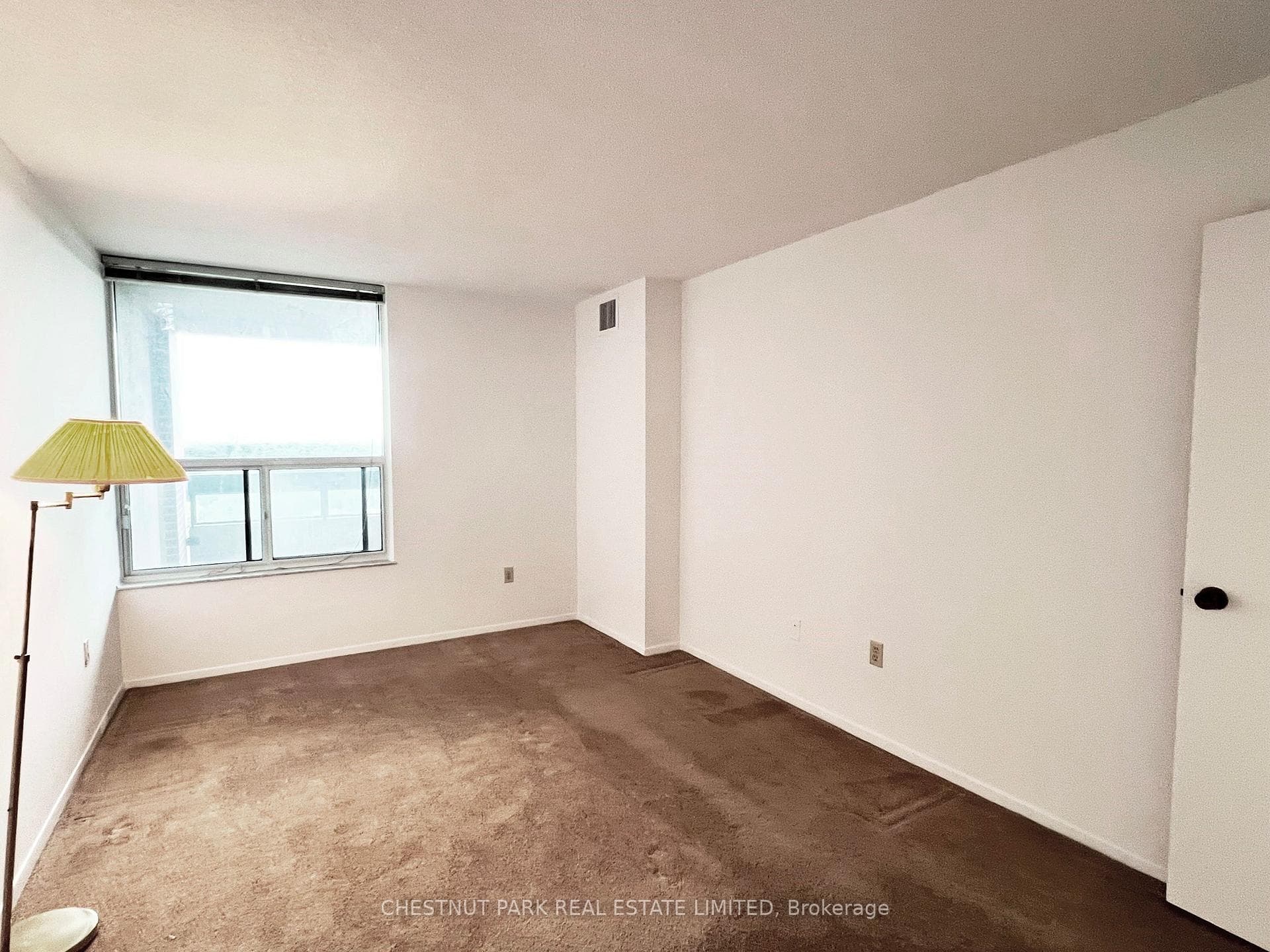 Spacious primary bedroom o/looks balcony