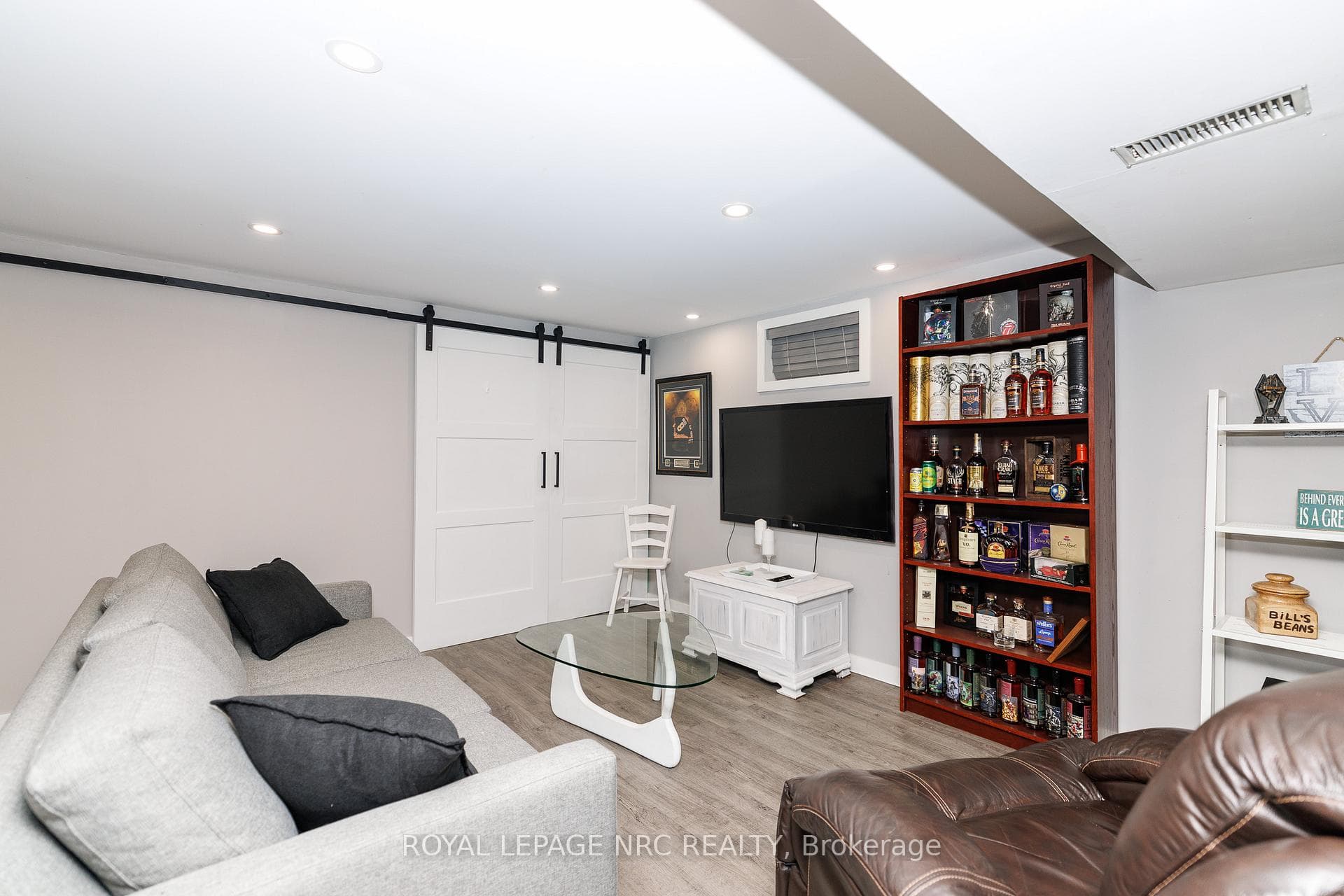 Doors to one of the two basement bedrooms.