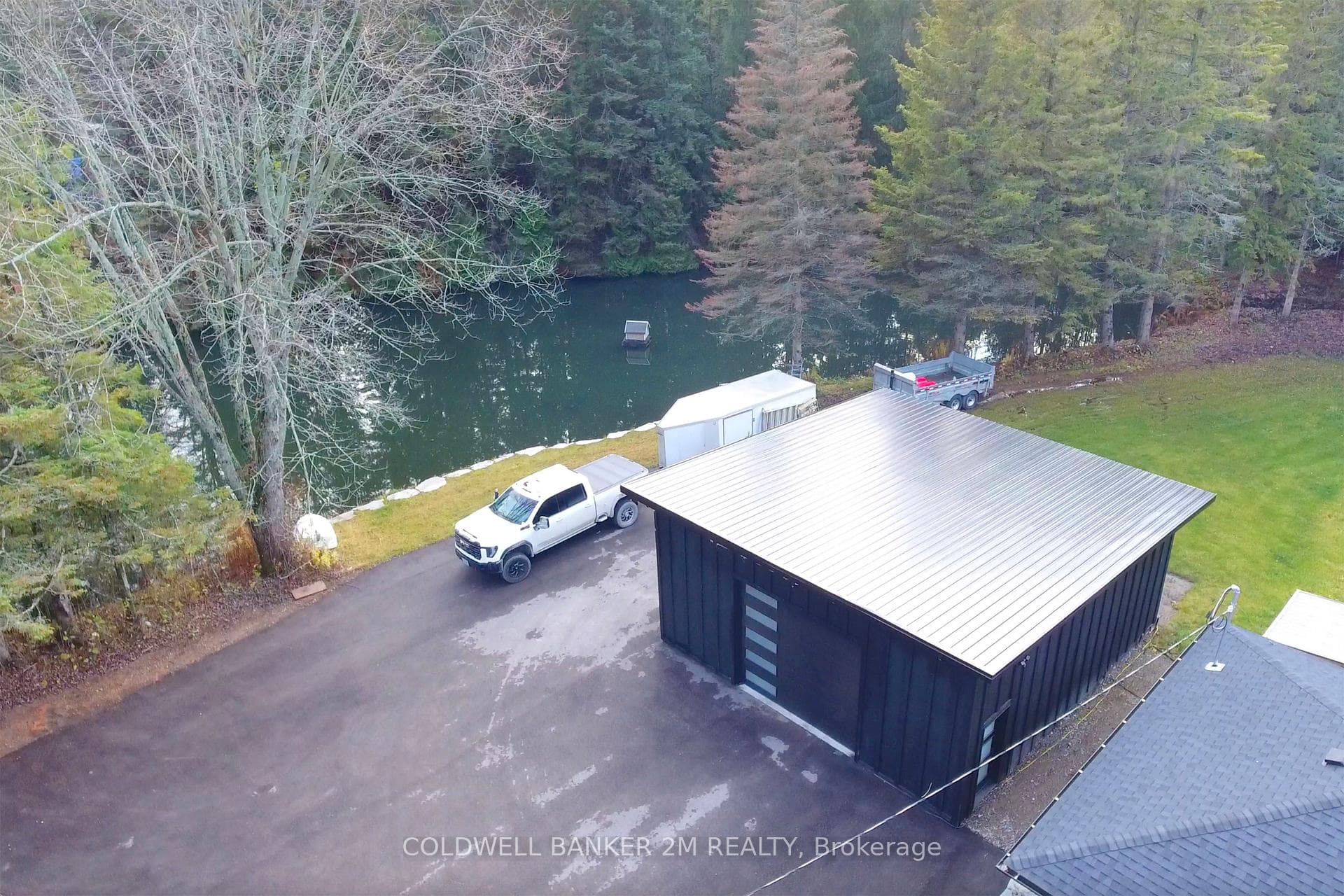 Aerial View of the Garage & Driveway.