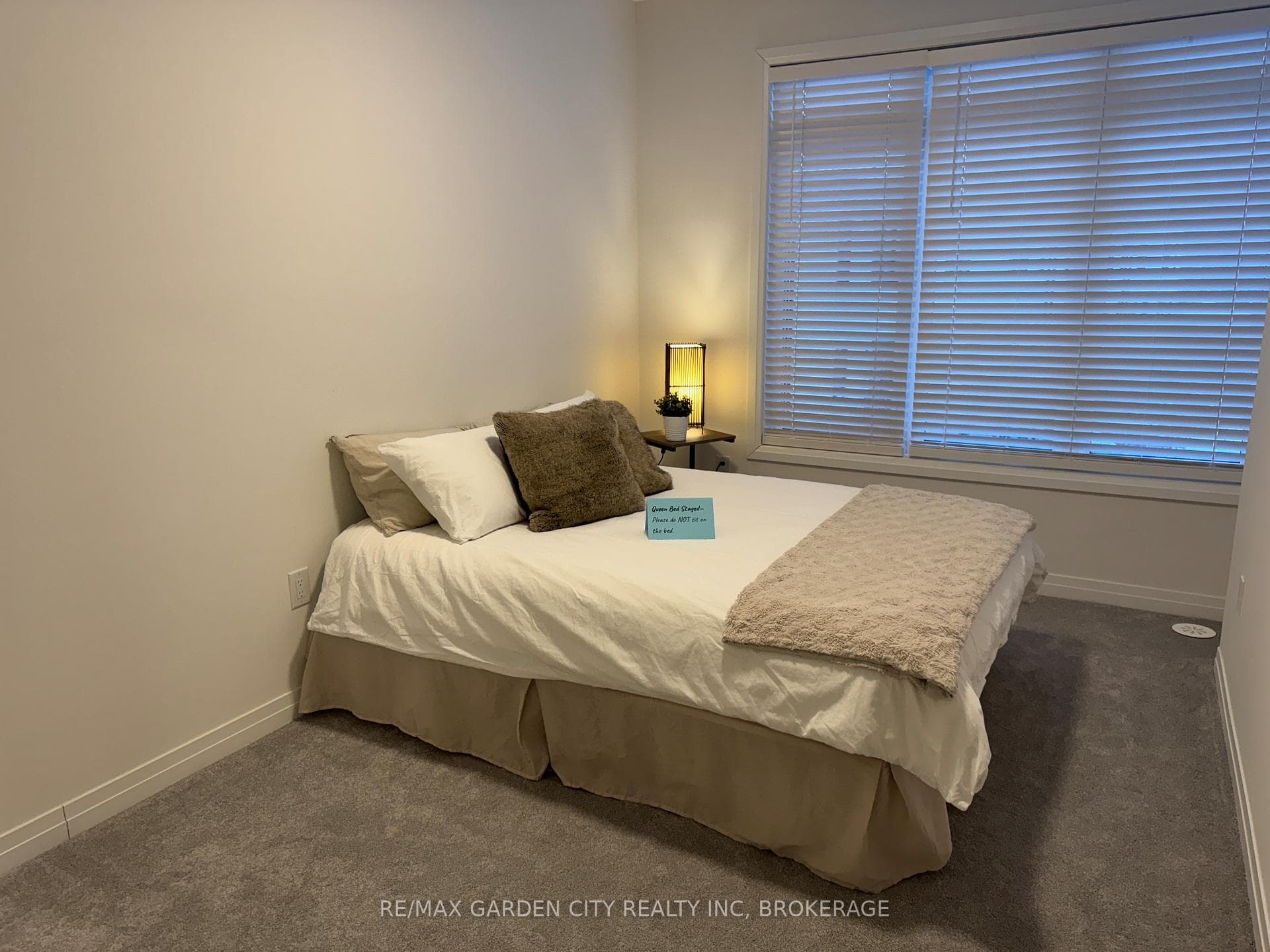 Primary bedroom featured with a queen size bed