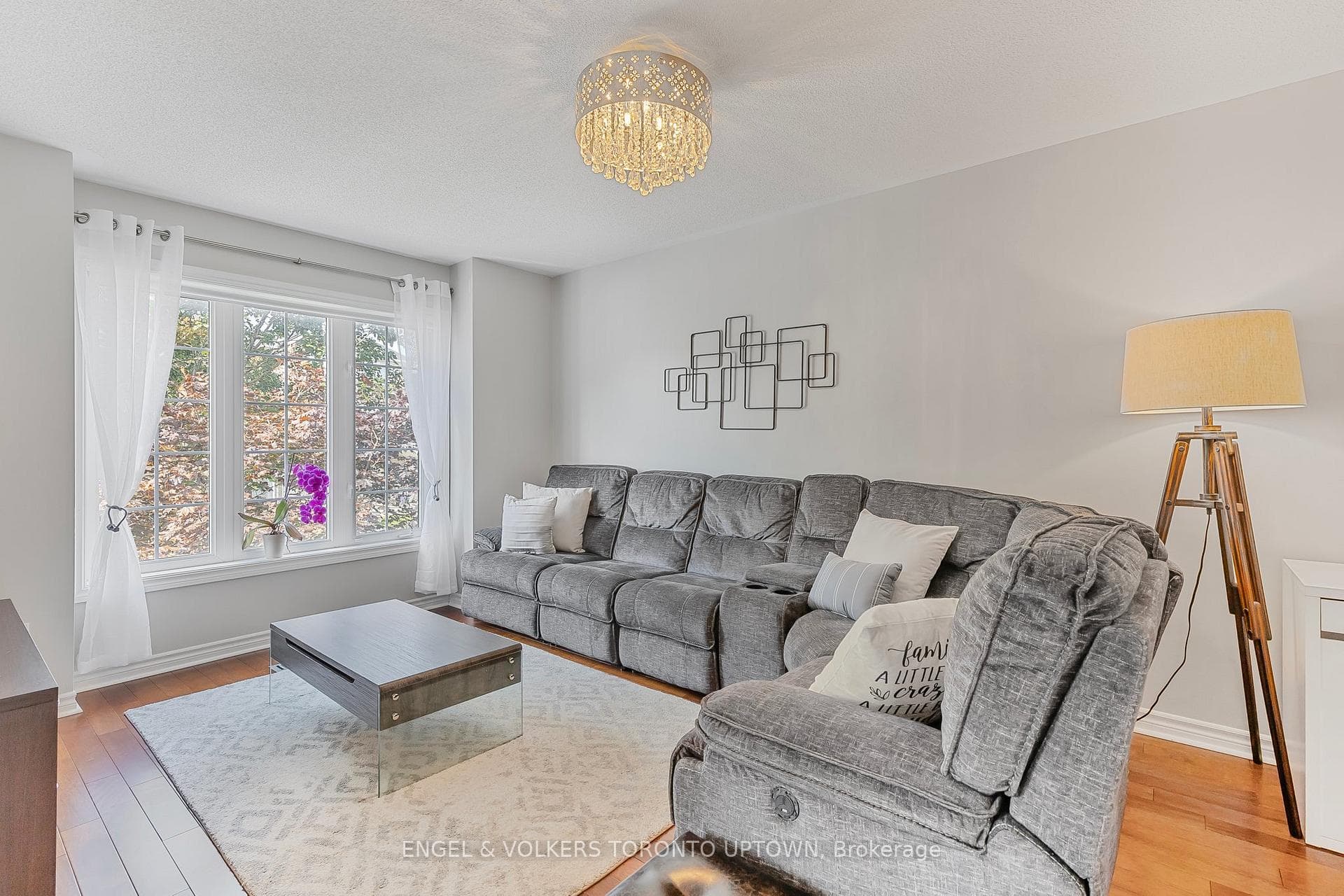 Bright family room with hardwood flooring