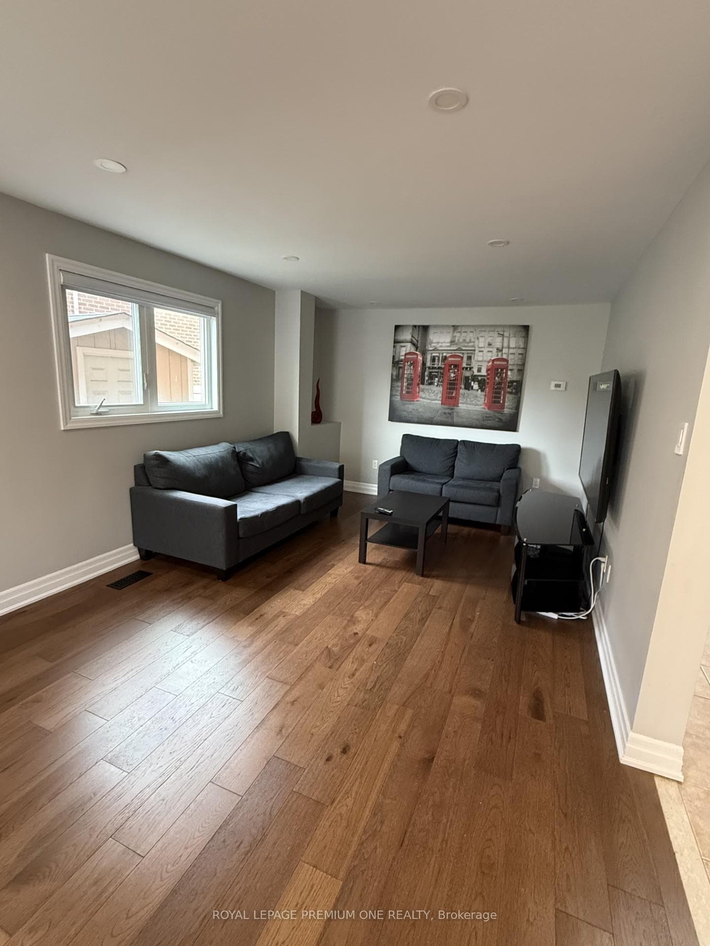 Renovated Living Room with plenty of light.