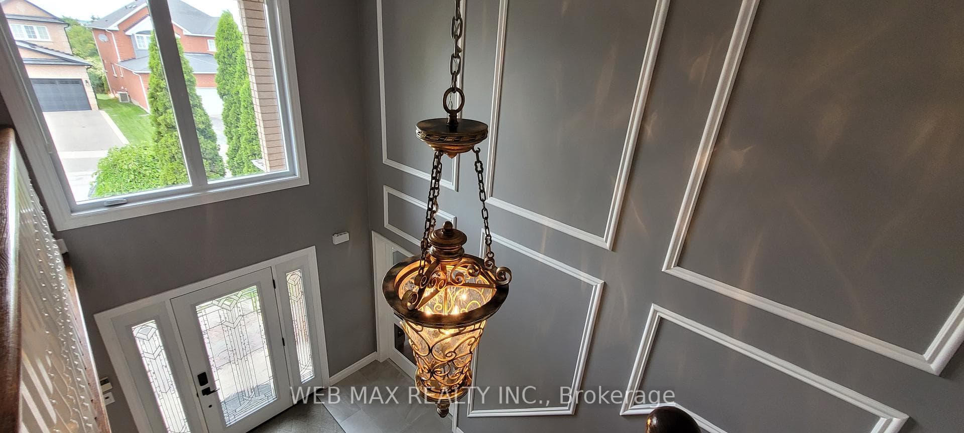 wainscoting floor to ceiling in foyer
