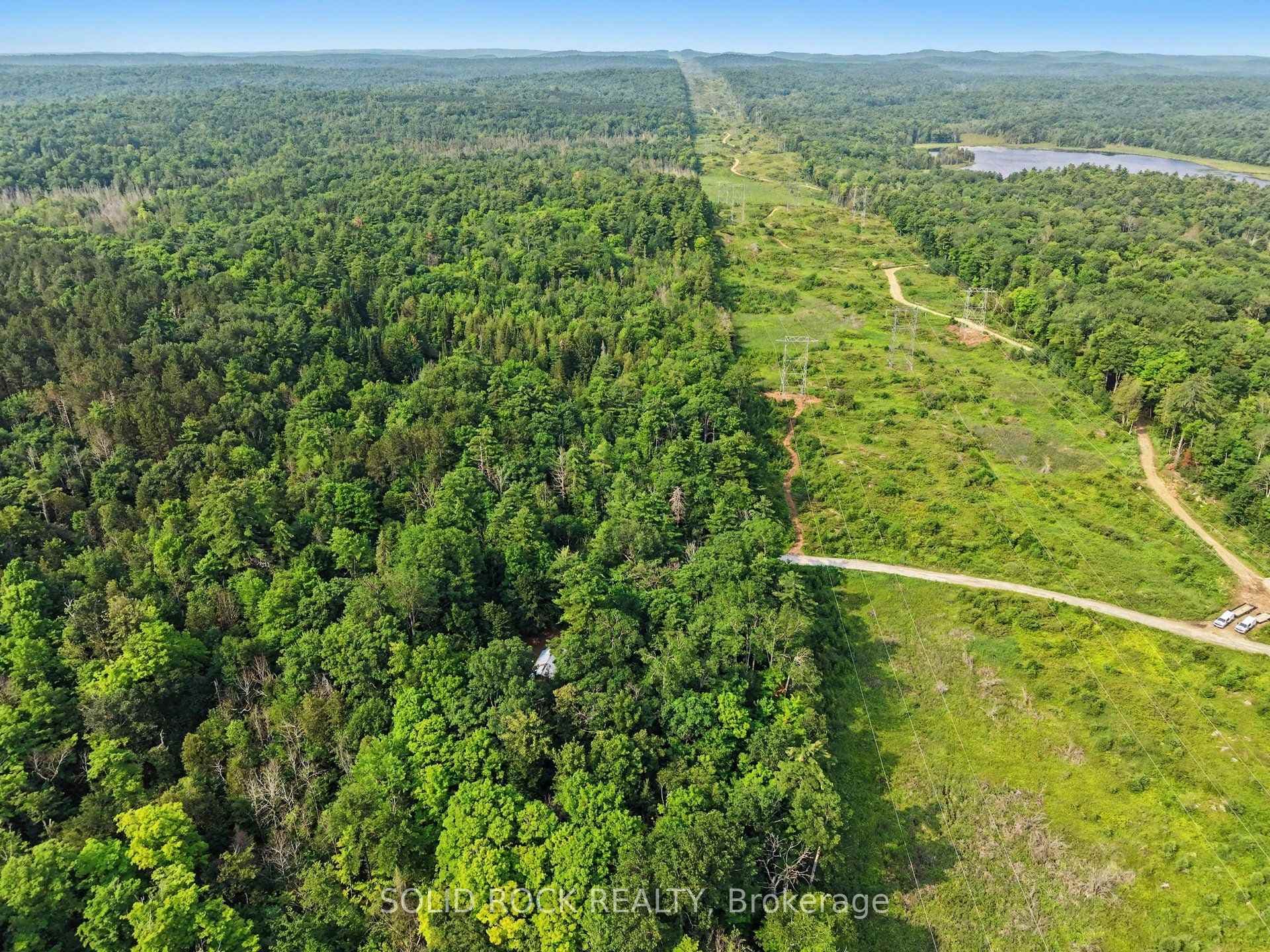 Hydro corridor runs through side of property.