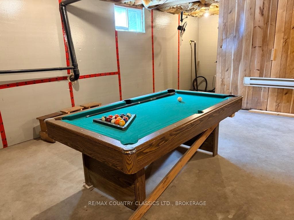 Basement - lots of space/height for a pool table!