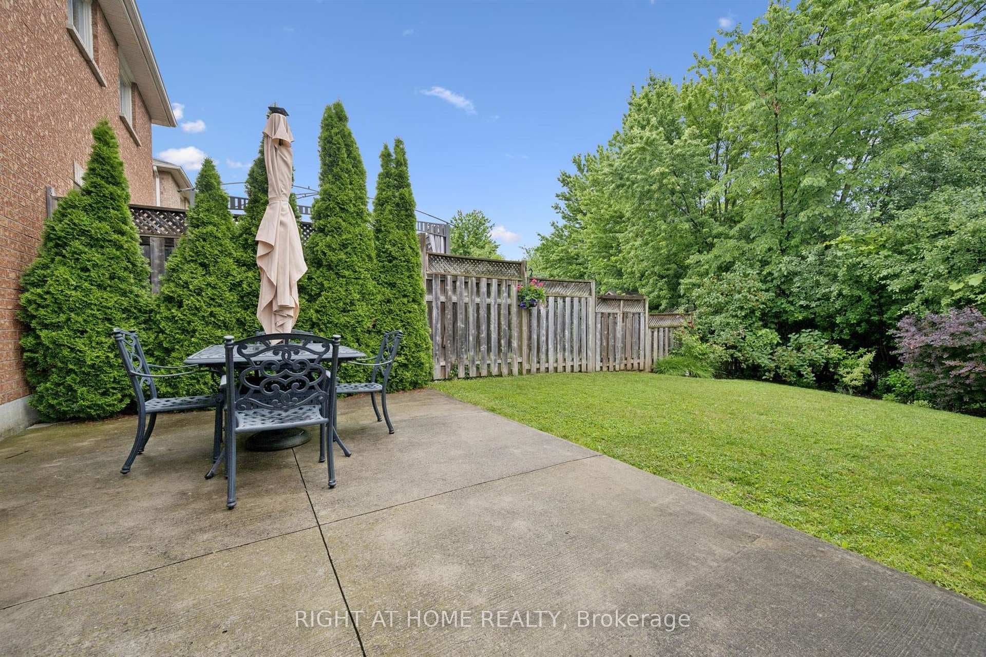 Private backyard patio for summer meals outside.