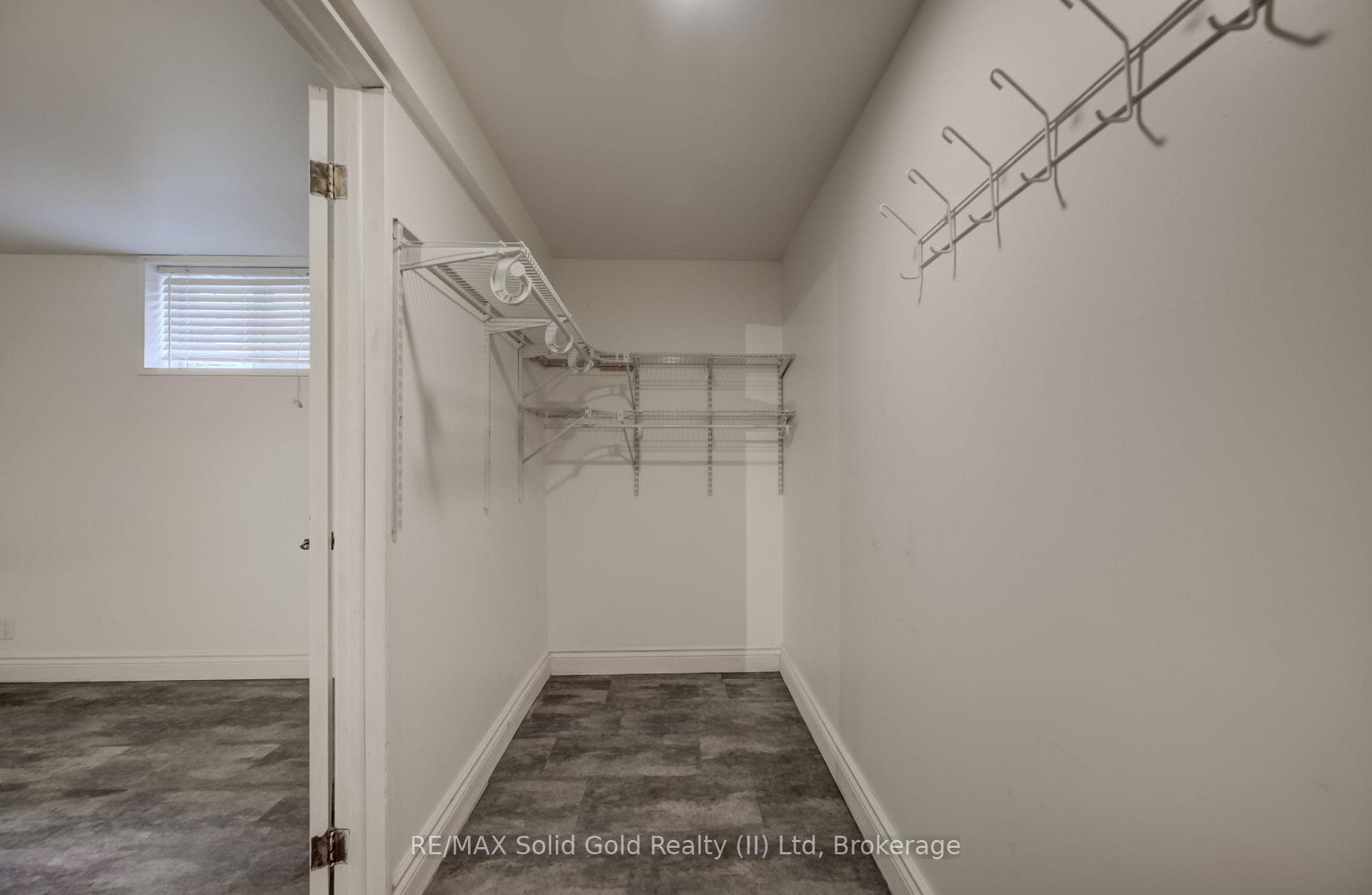 Walk-in closet for primary bedroom.