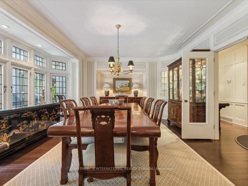 Elegant Dining Room w/ Corner Built In Cabinets