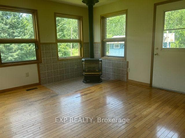 sunroom with propane stove