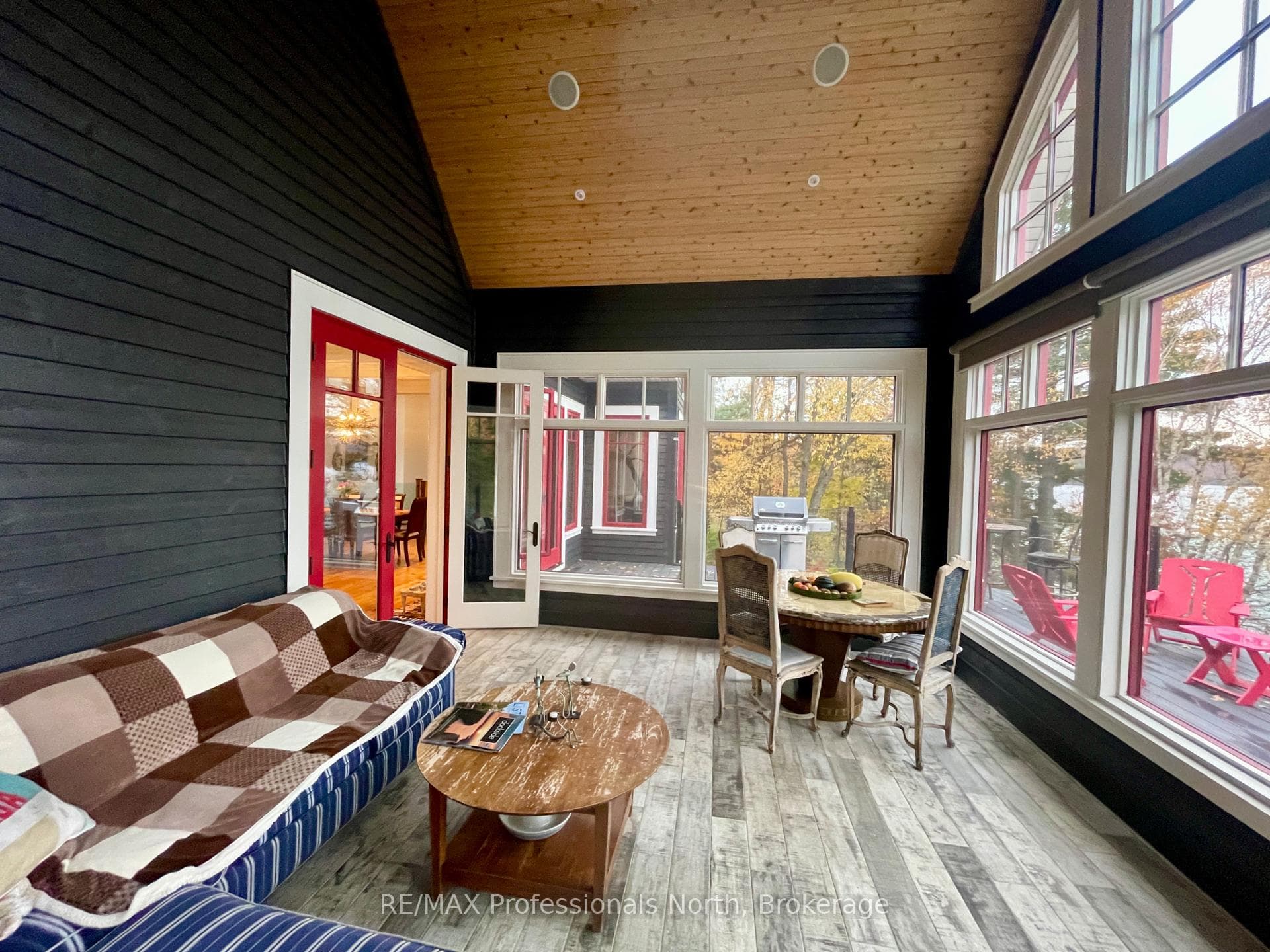 Muskoka Room with wood burning Fireplace