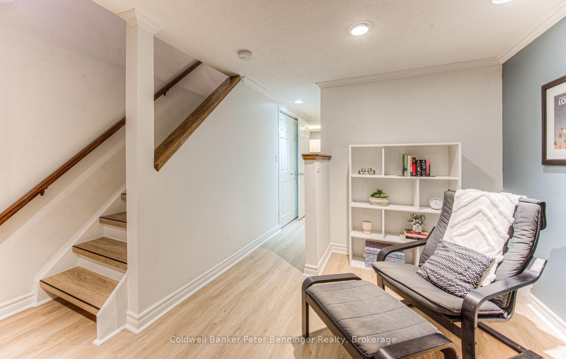 Rec room with gas fireplace in basement.
