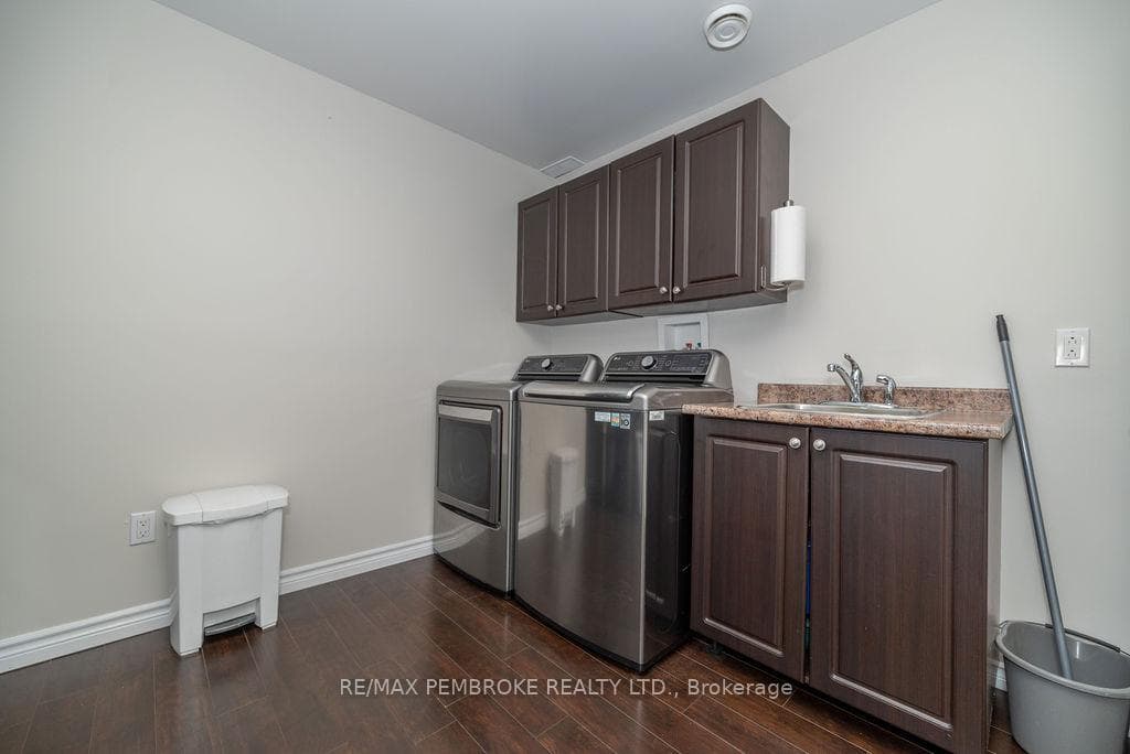 Lower level laundry room.