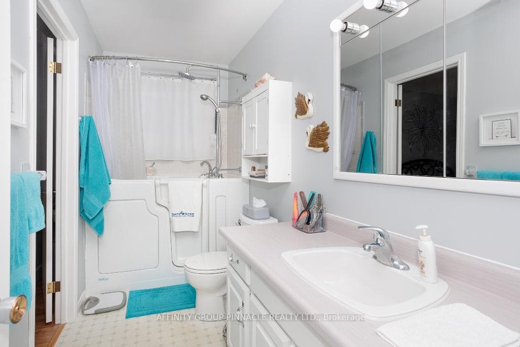 Main bath with Safe Step walk in tub.