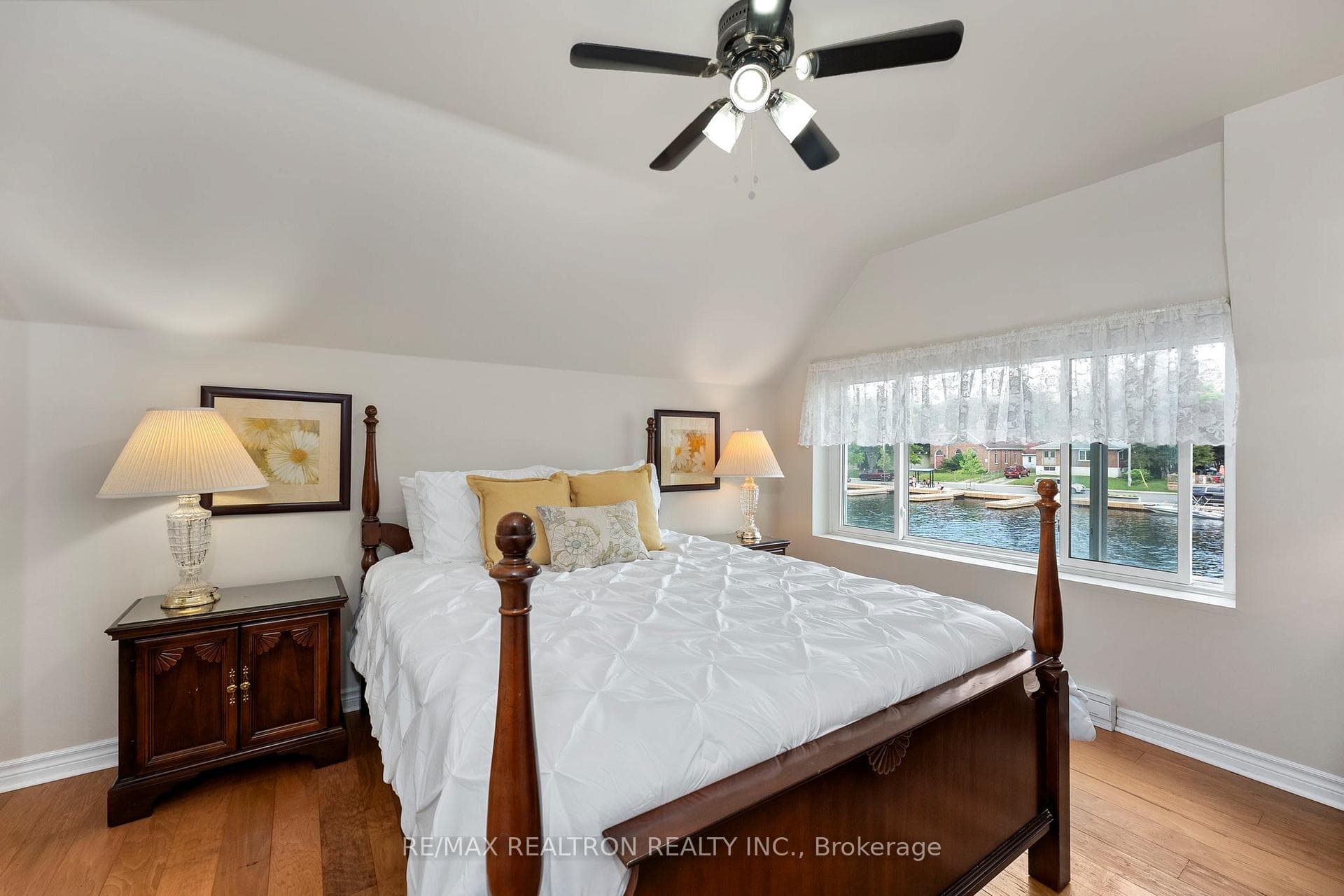 The primary bedroom boasts stunning water views