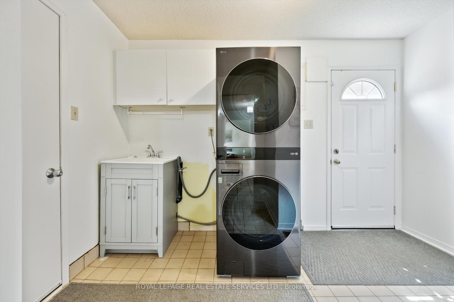 Main Floor Laundry with Garage & Side Yard Access