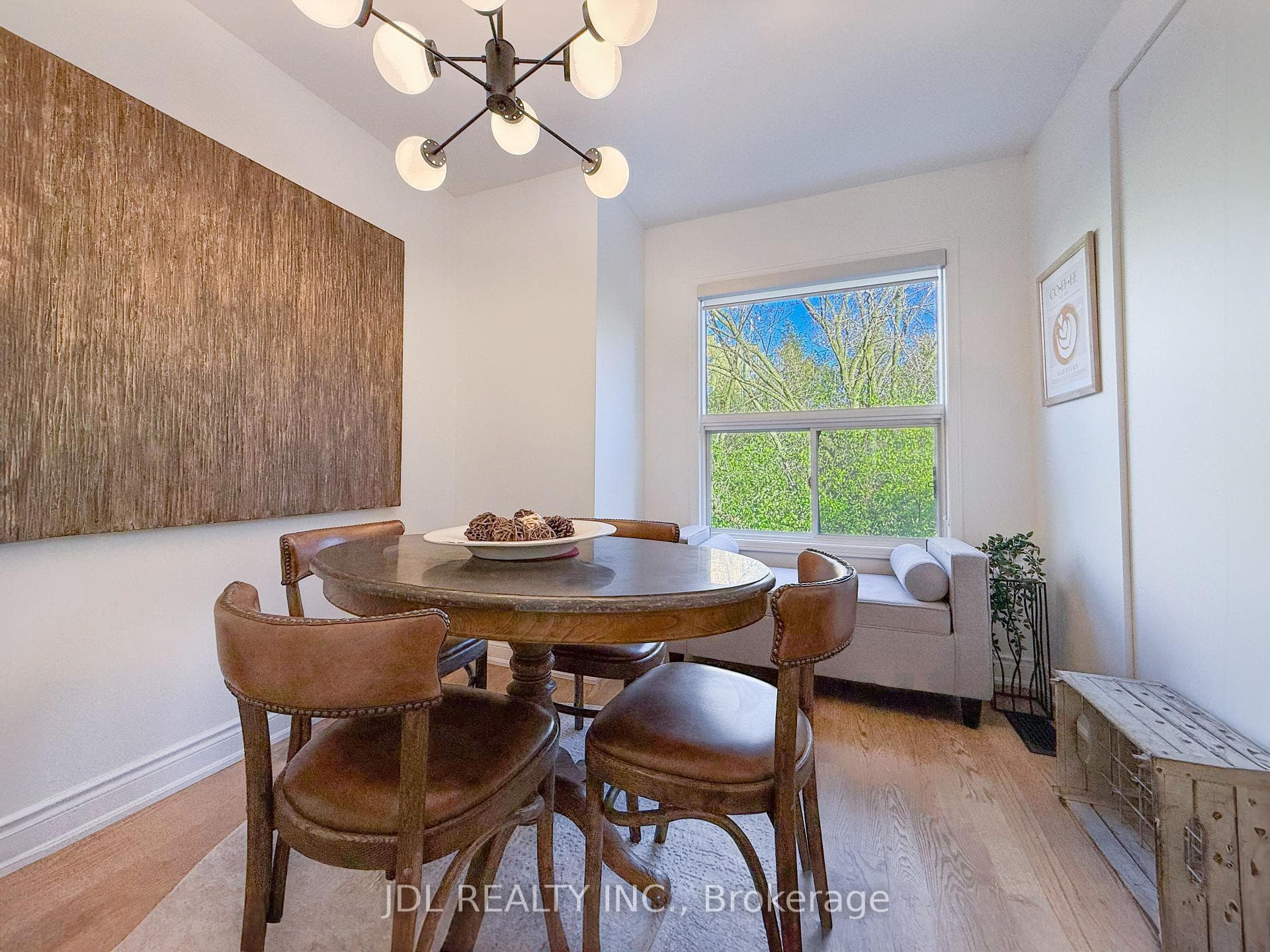Spacious dining room with green ravine views