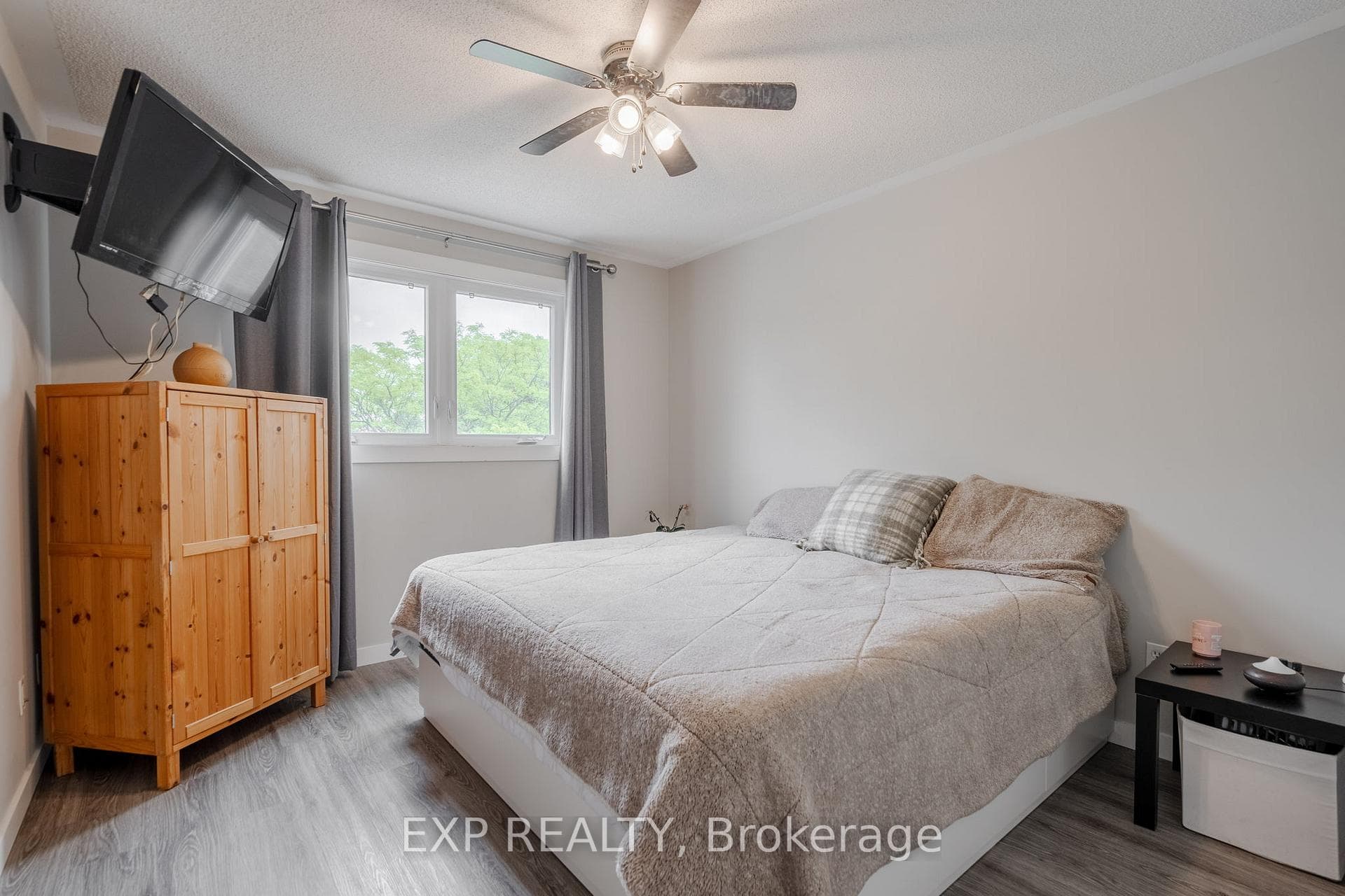 Master bedroom with hard surface floors.