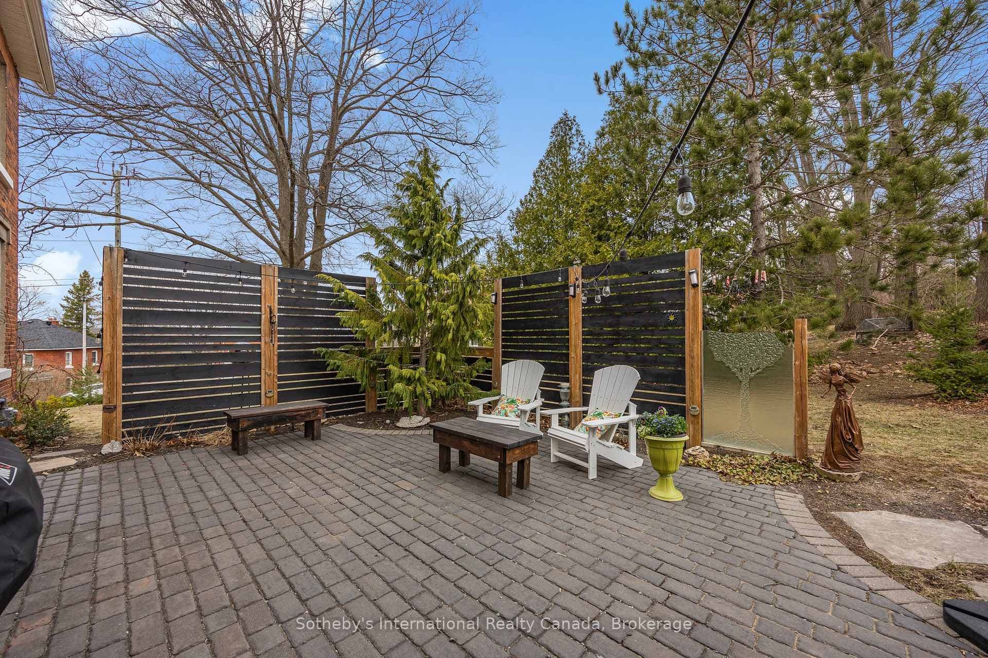 Back porch, privacy fence, interlock