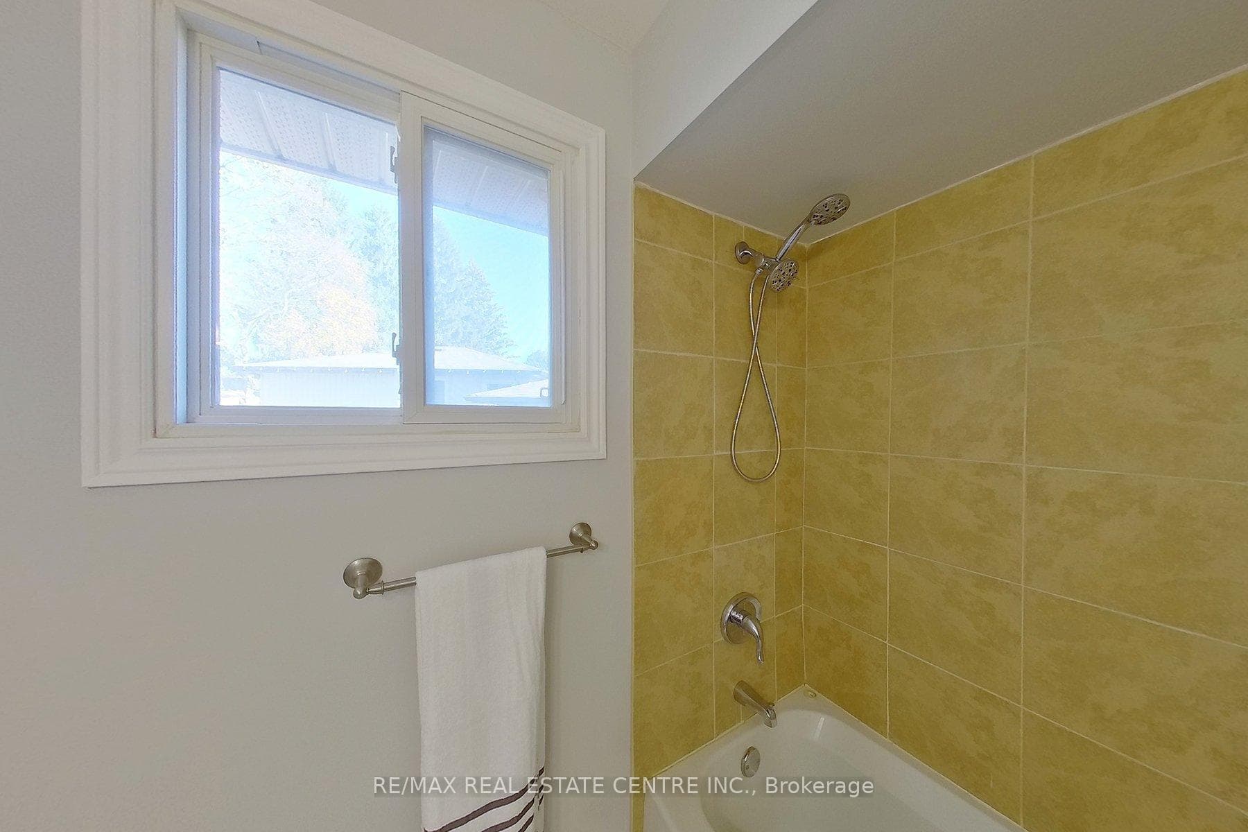 Main Floor 4 Piece Bathroom With Newly Tiled Floor
