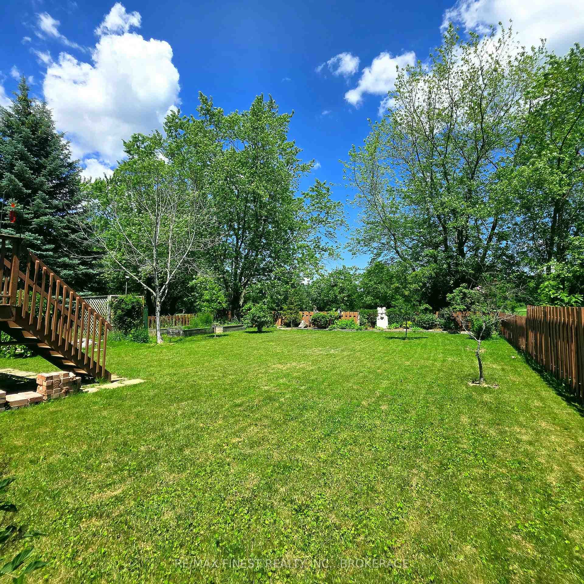 View from gate to back fence. Lot 150' deep.
