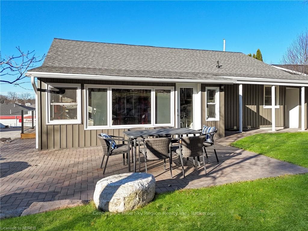 Back of house featuring a patio area and a yard