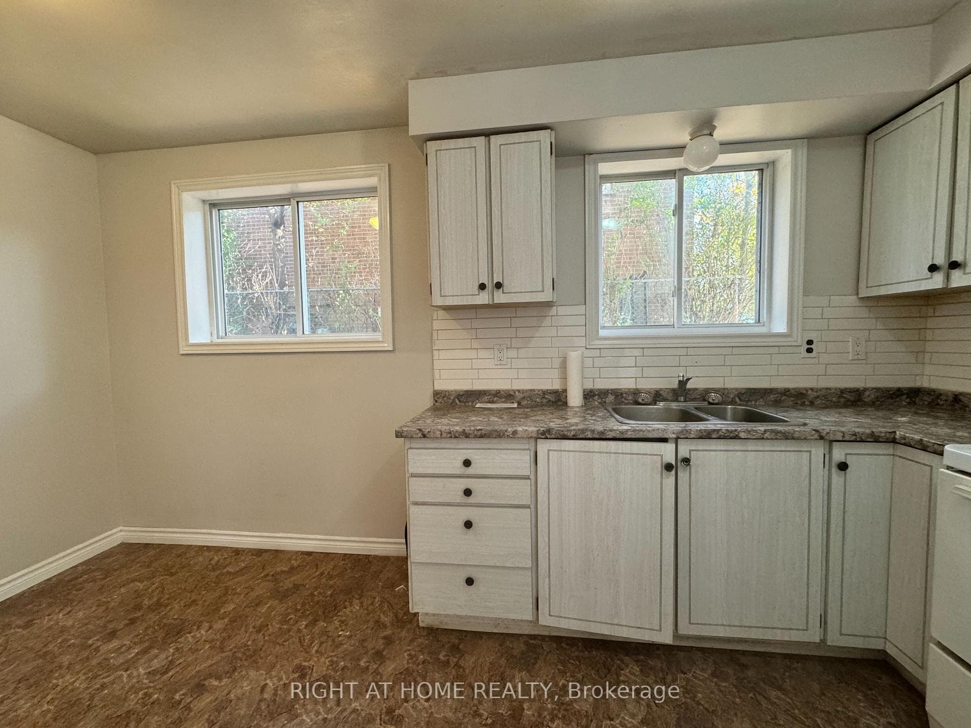 Kitchen with new Fridge and stove
