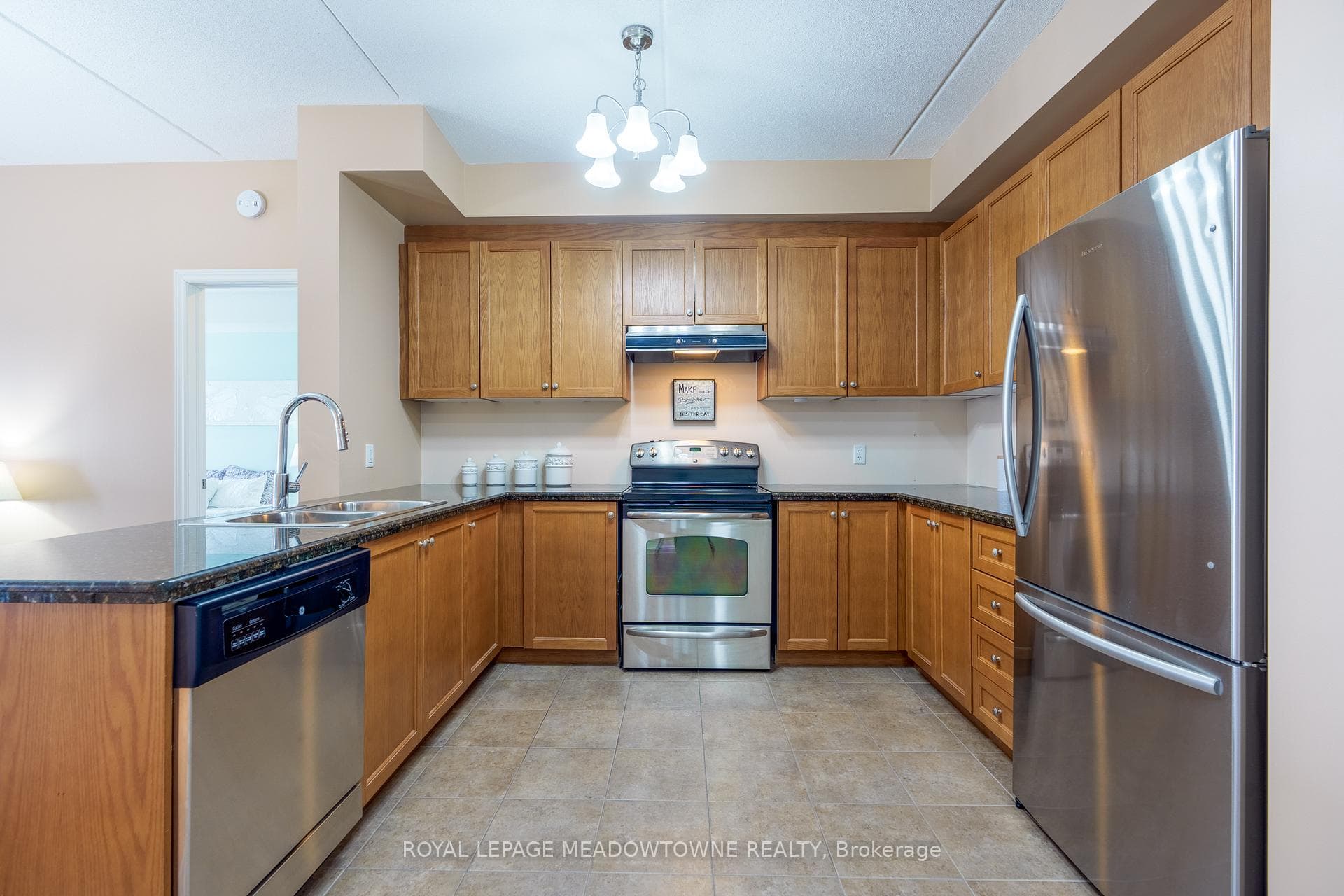 large kitchen with granite countertops