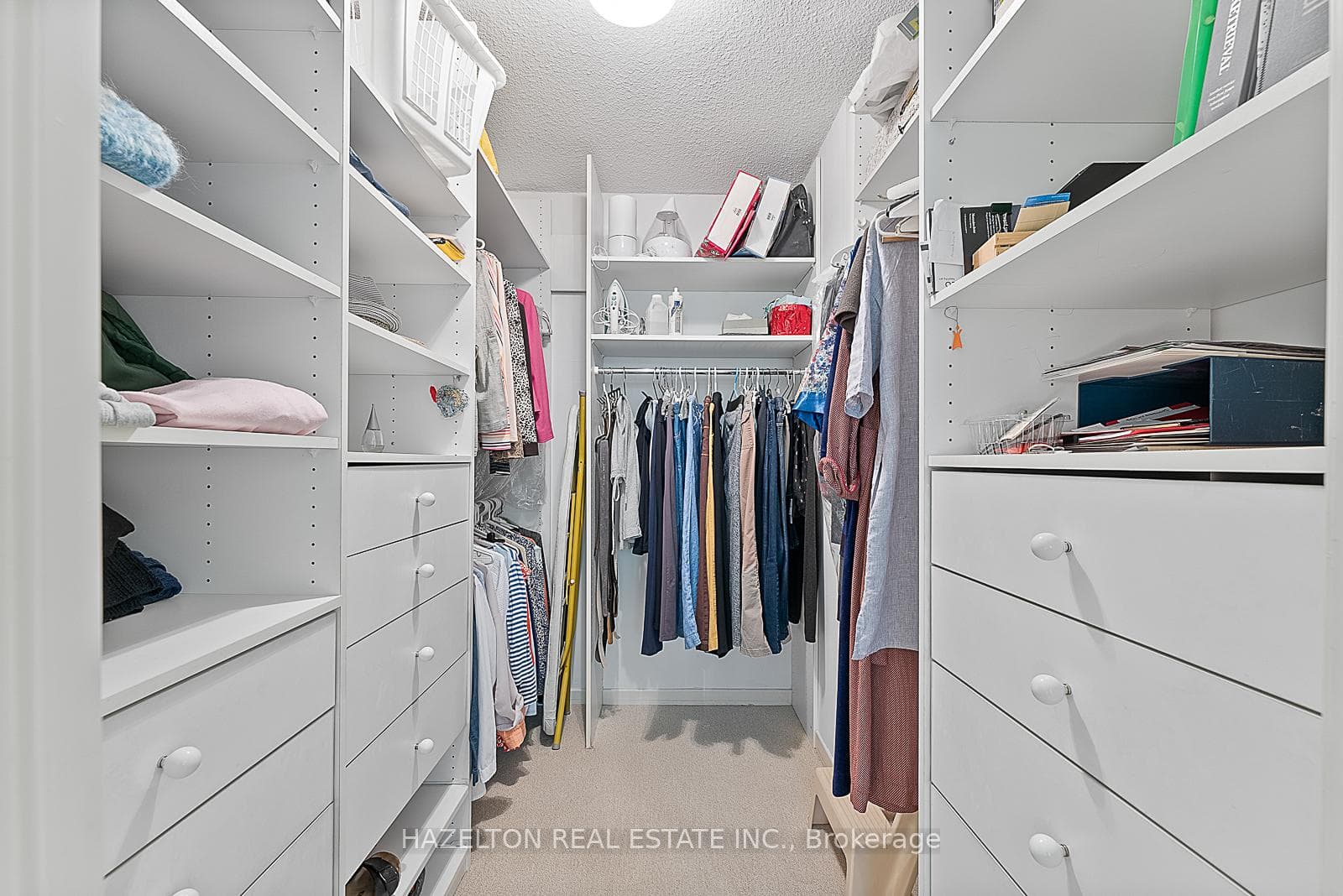 of two walk in closets in primary bedroom
