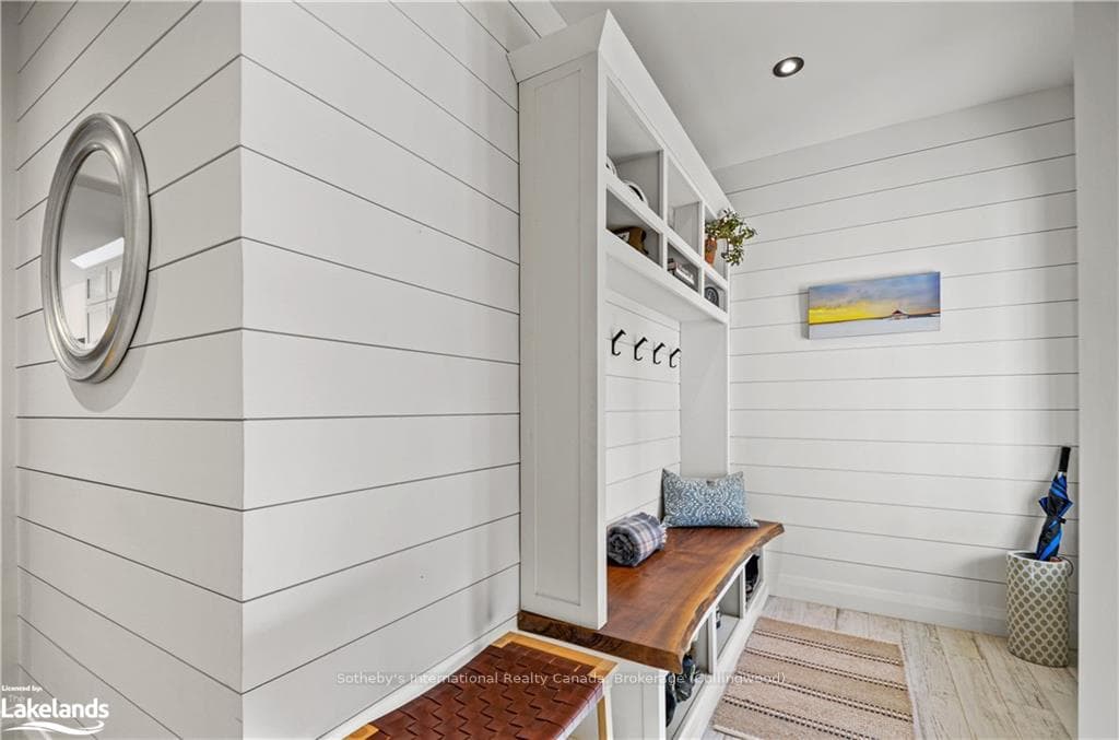 Mudroom featuring light hardwood / wood-style floo
