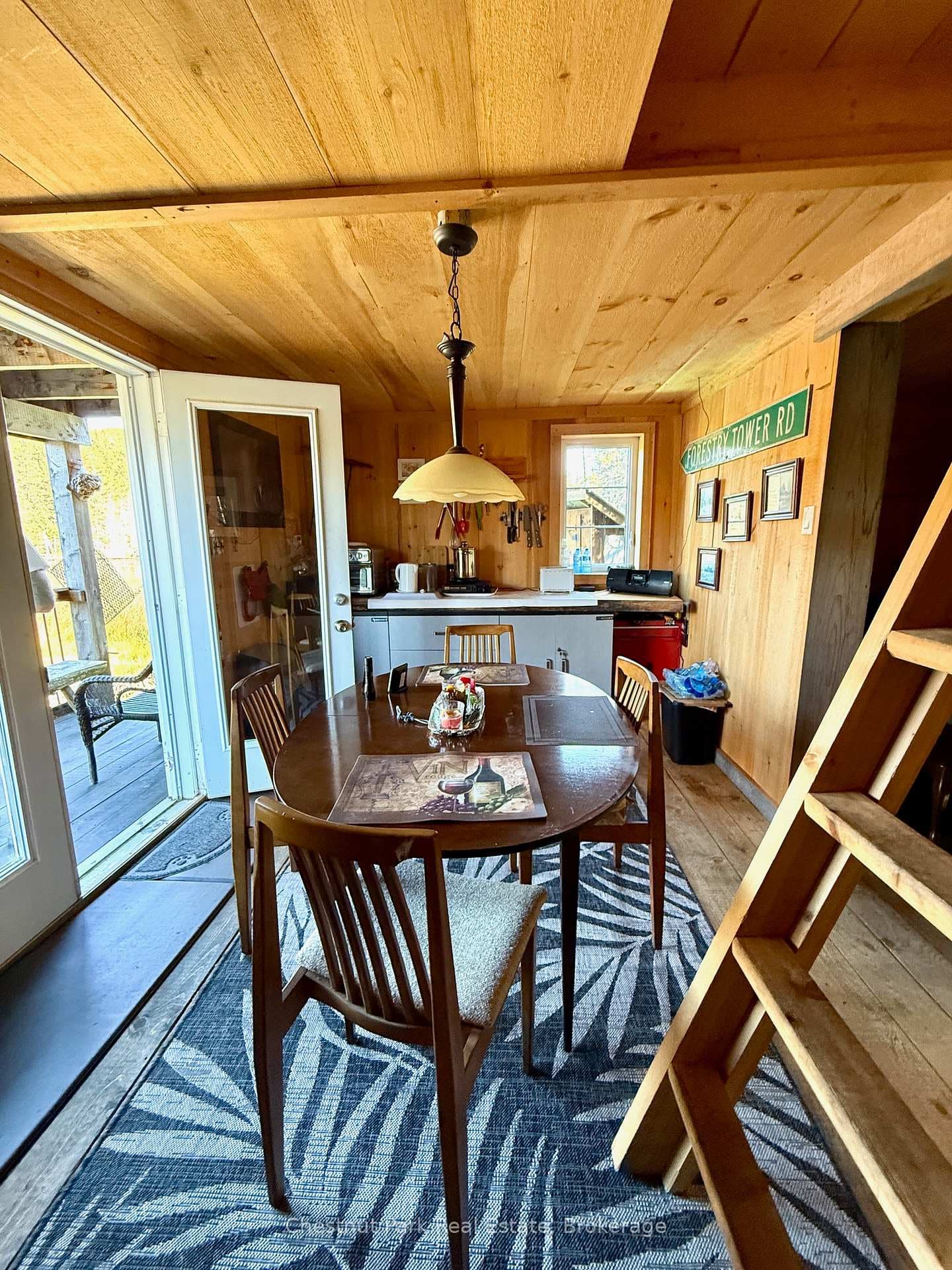 Cabin has kitchen, living/dining, sleeping loft