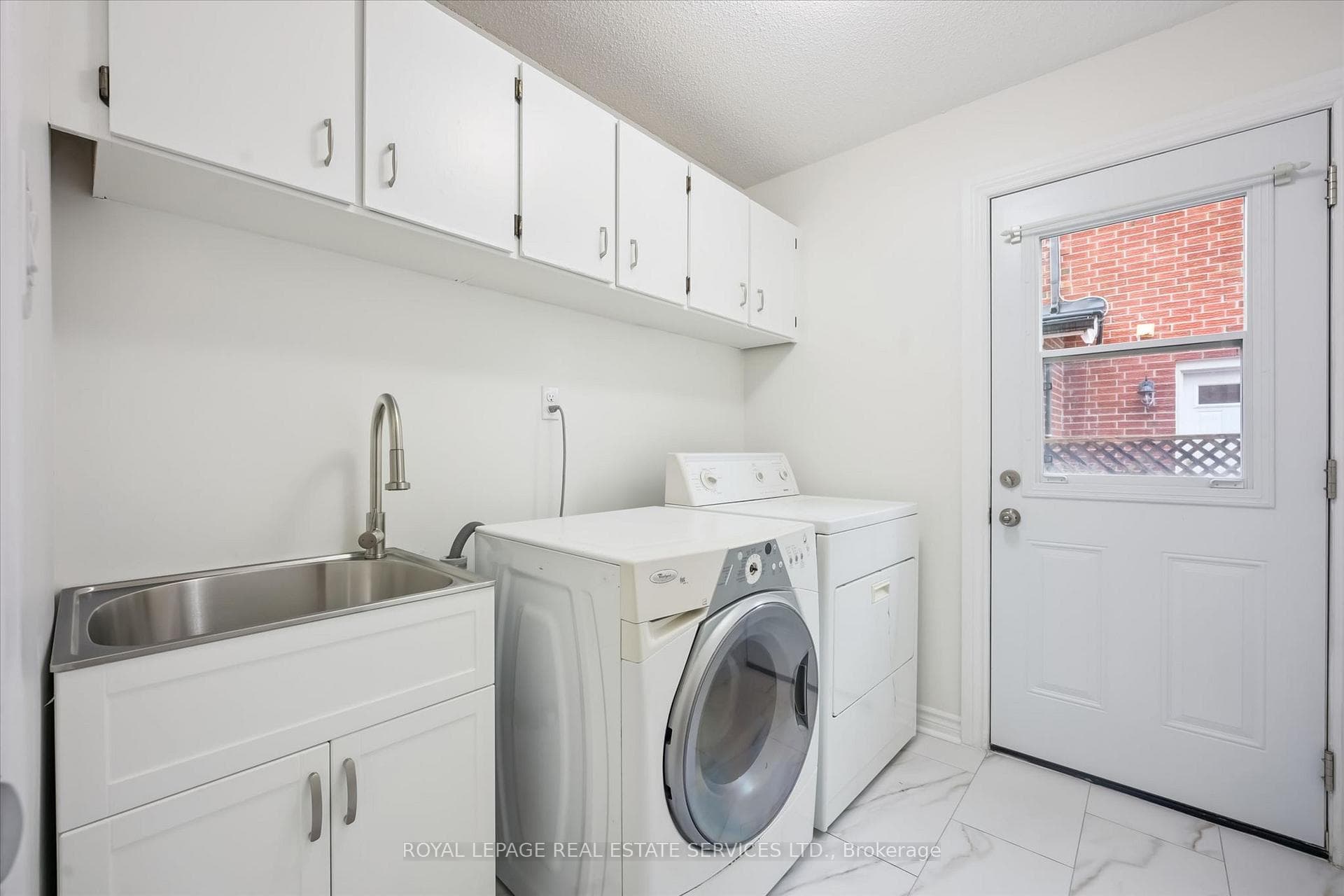 Main Floor Laundry Room with Side Yard Access
