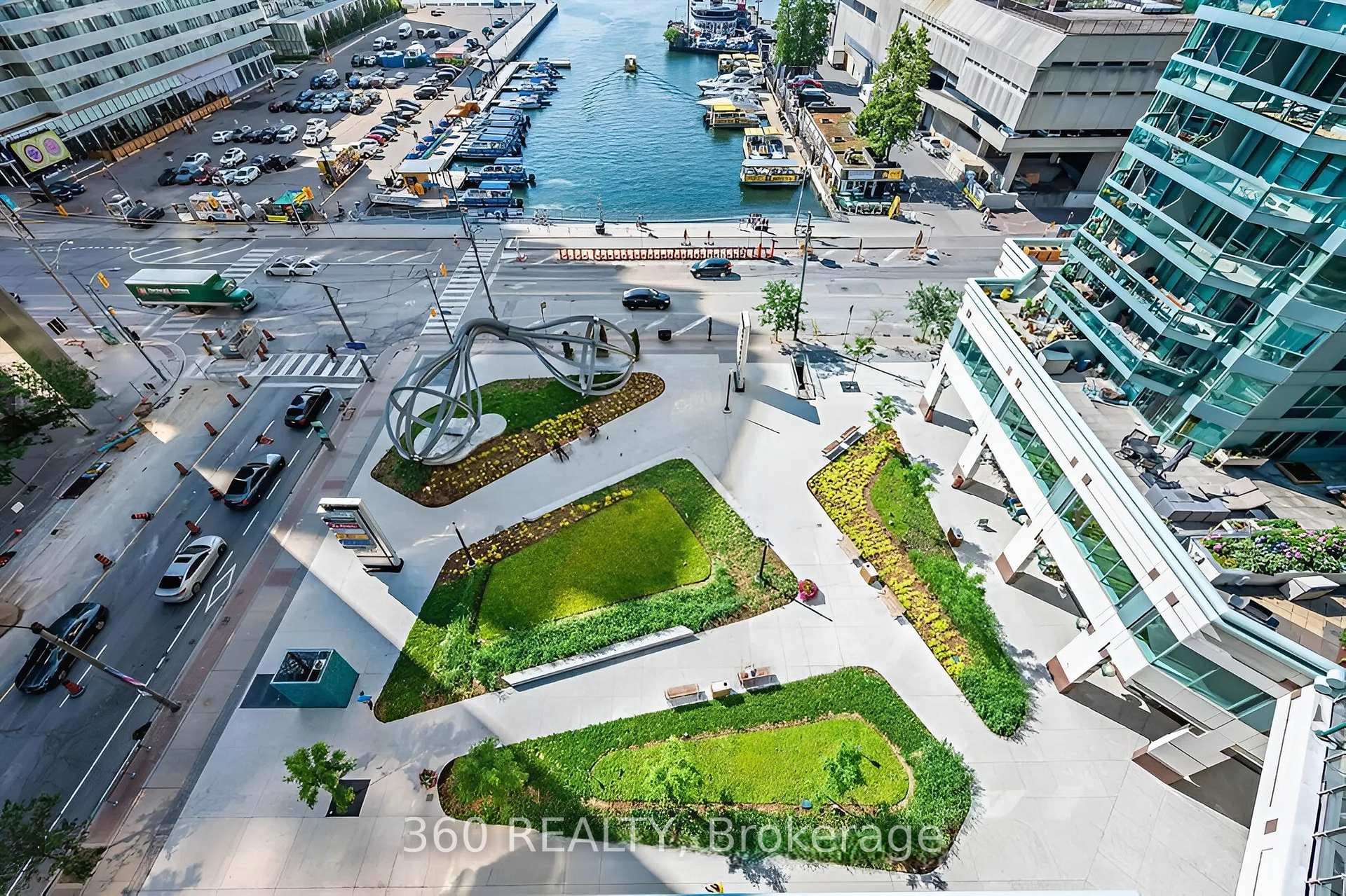 Manicured front of building & lakeview from suite