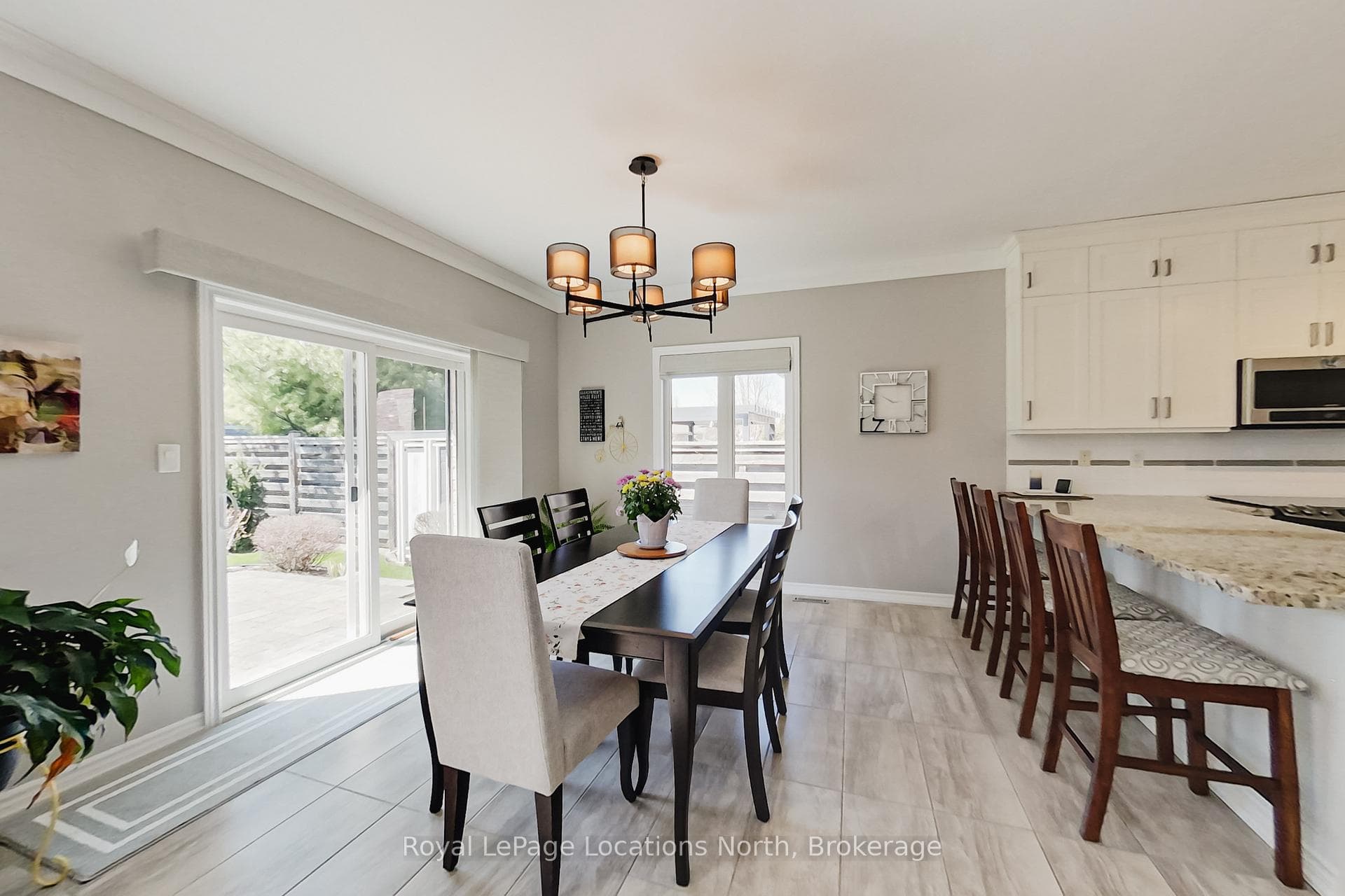 Dining Overlooks Backyard Retreat with Walkout