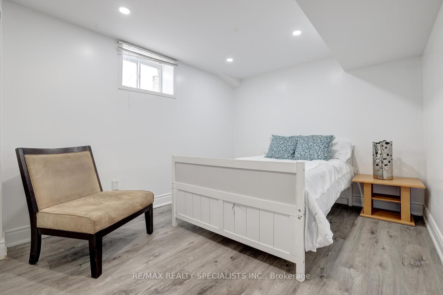 Lower level bedroom with above grade windows.