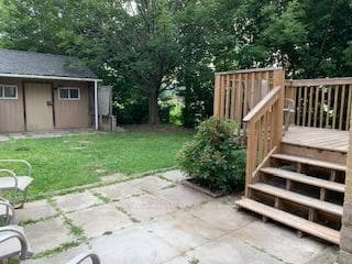 Backyard Deck, Stone Patio And Garden Shed