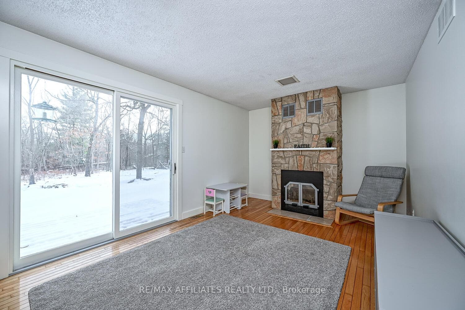 Family room with cozy wood fireplace