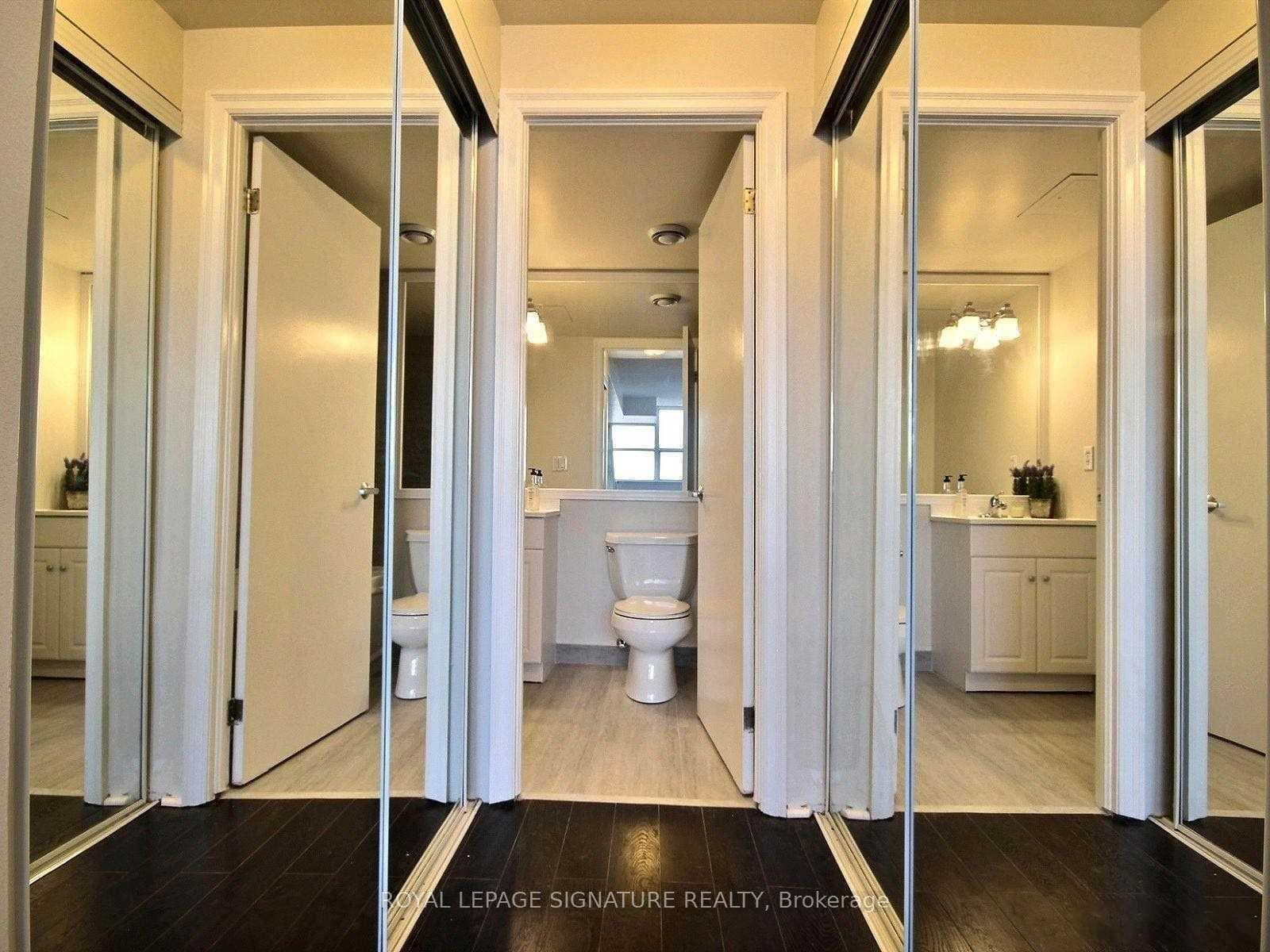 His & Hers Mirrored Closets in Primary Bedroom