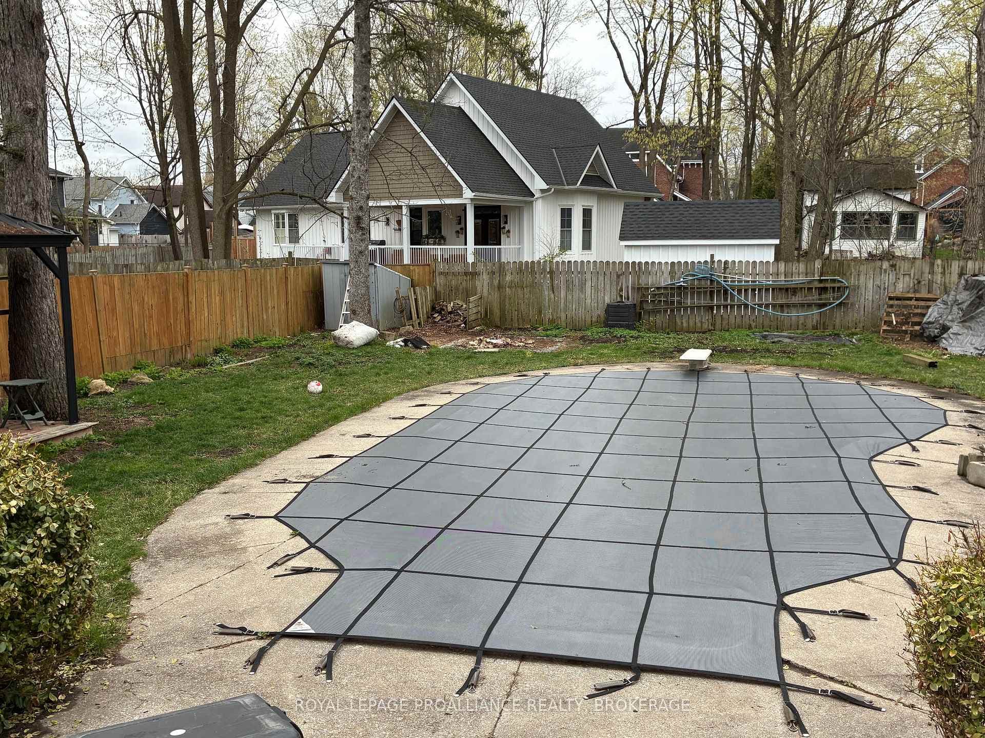Inground pool in large fenced yard