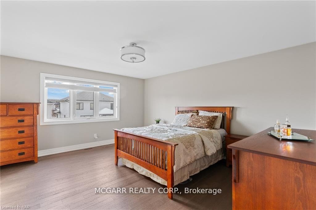 Second Level Primary Bedroom is Bright & Spacious