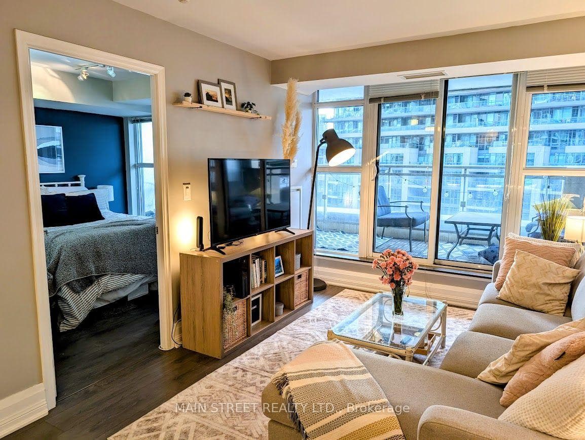 bright open concept living space with 2 walkouts
