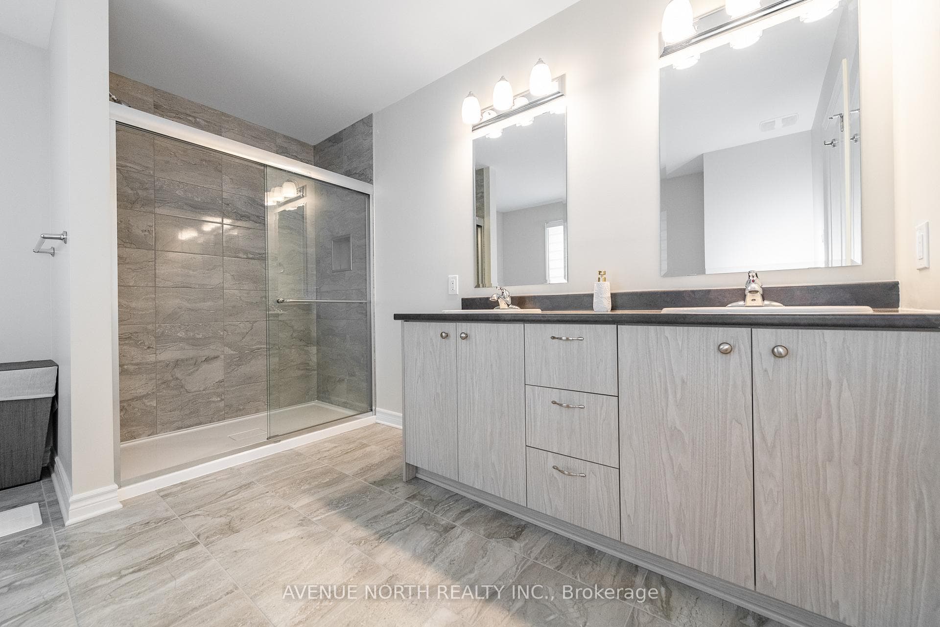 Glass-Enclosed Stand Up Shower.