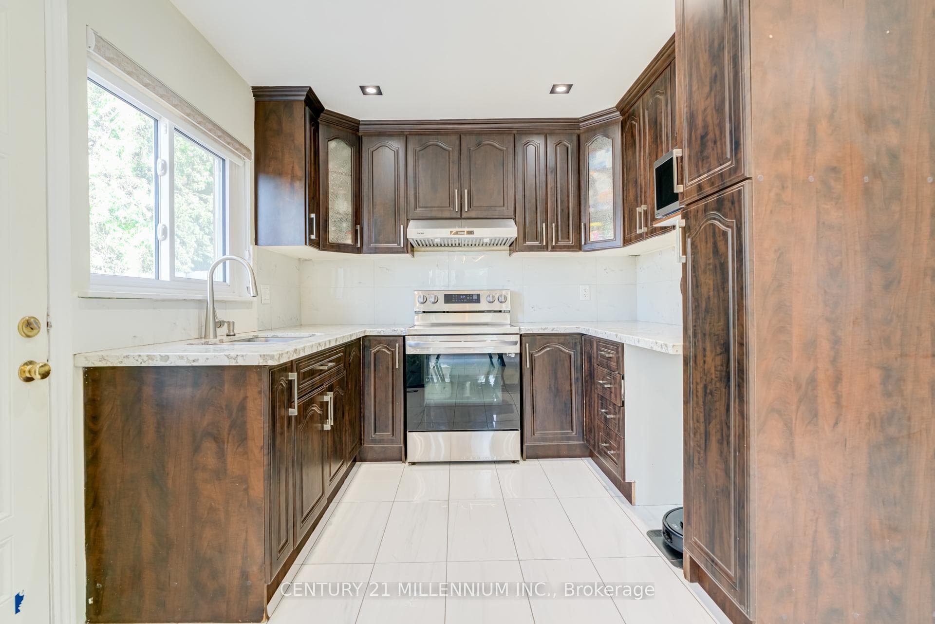 Quartz Countertop and Pantry In Kitchen