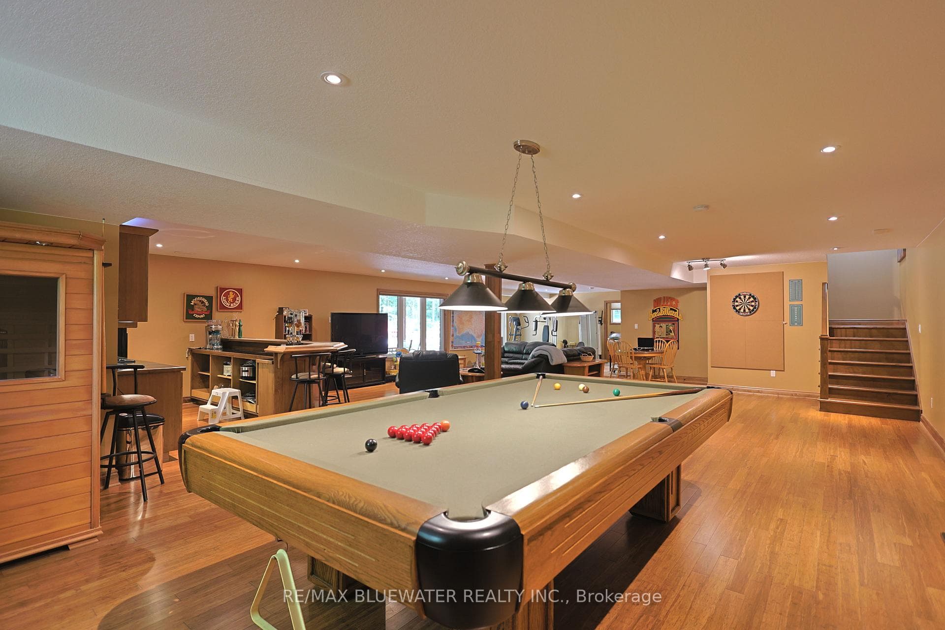 Lower Level Games Room with Hardwood Floors