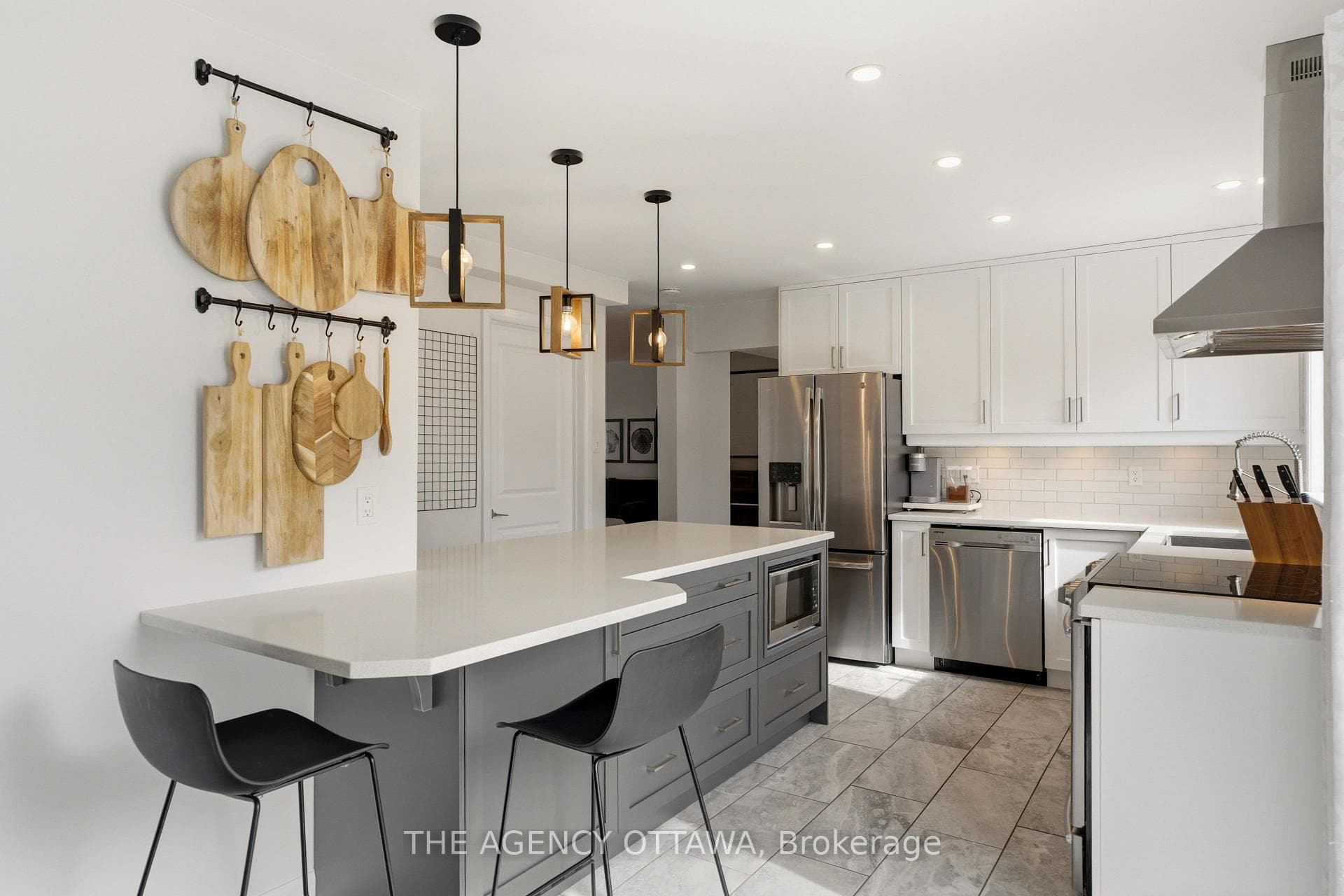 Darker island contrast with bar seating
