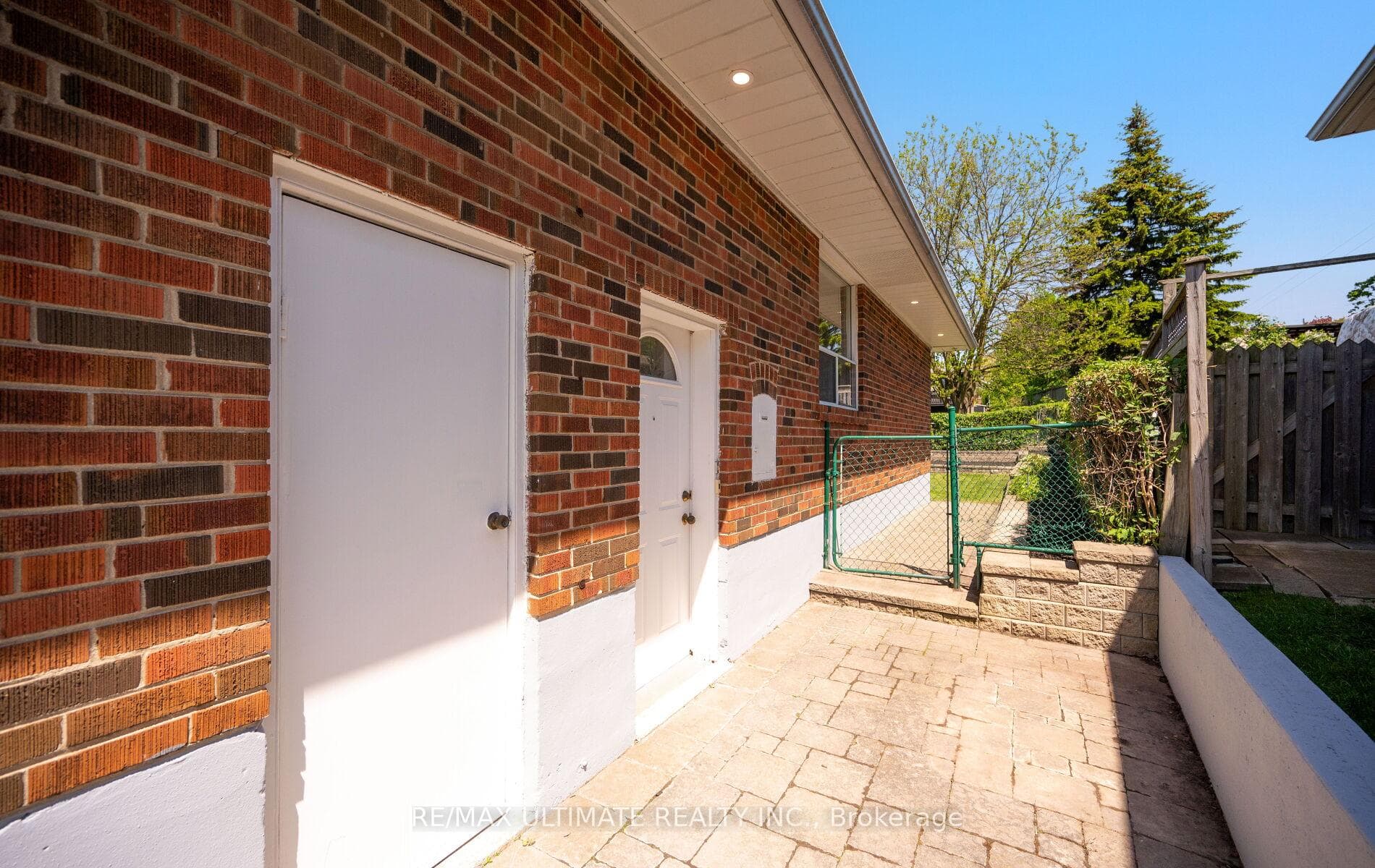Man door for garage & separate entrance to house