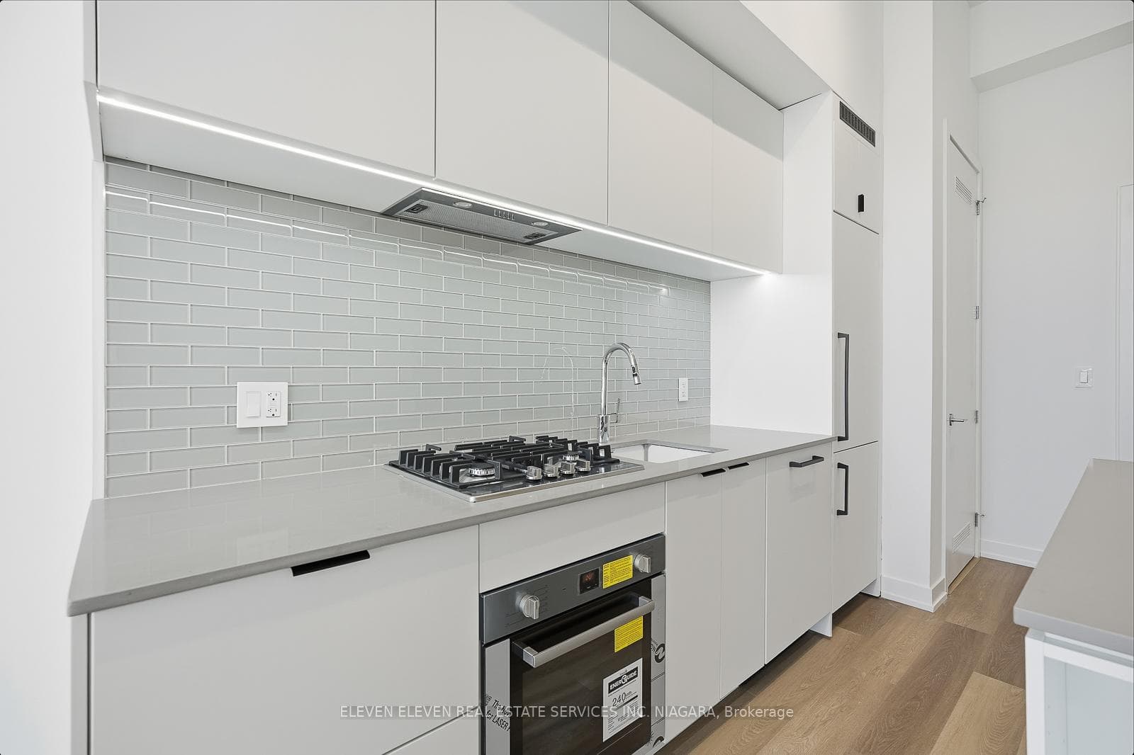 Valance lighting brightens up Kitchen.