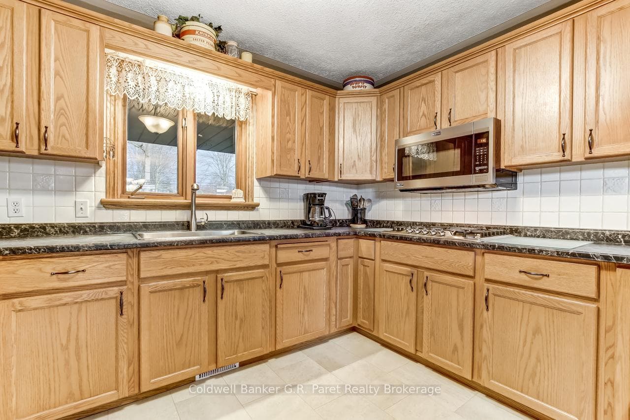 Kitchen with built-in appliances