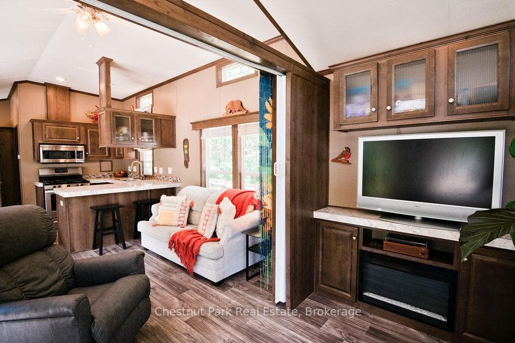 Den can double as a bedroom with a sofa bed