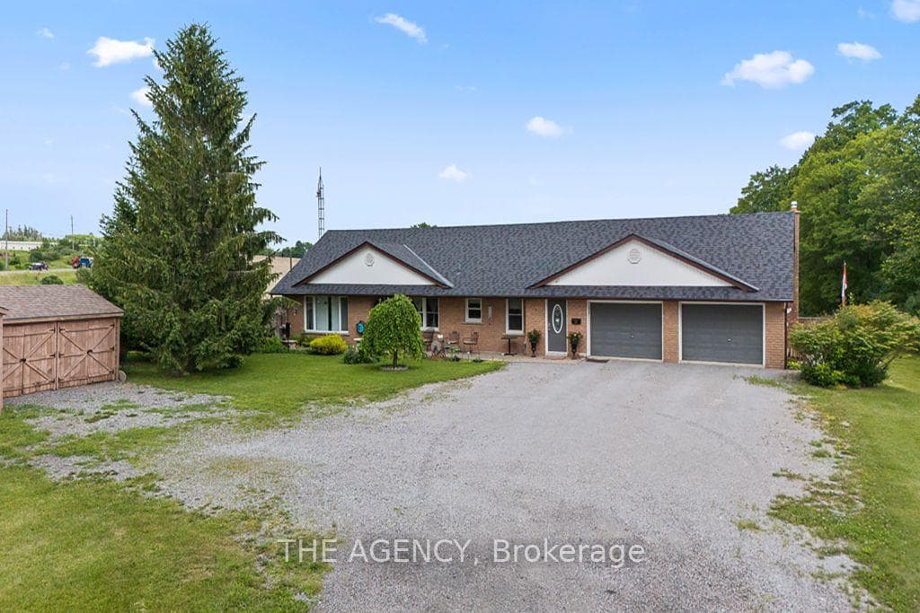 Brick bungalow with 2 attached garages