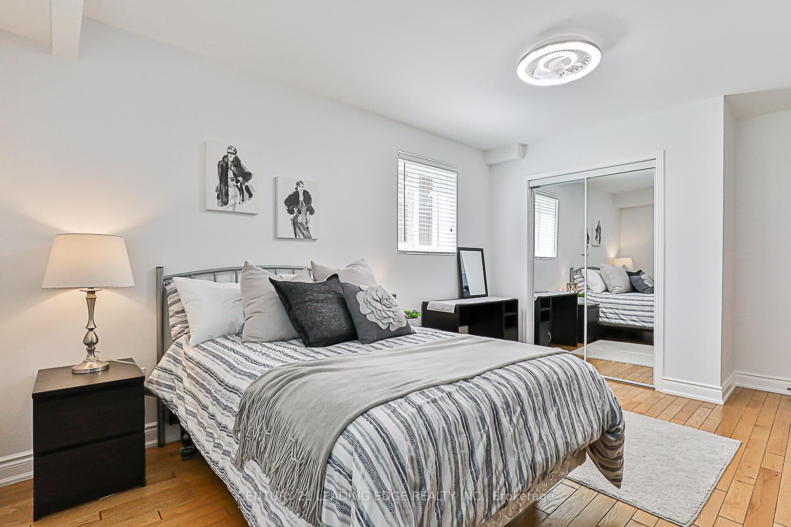 Above Grade Windows with Double Mirrored Closet